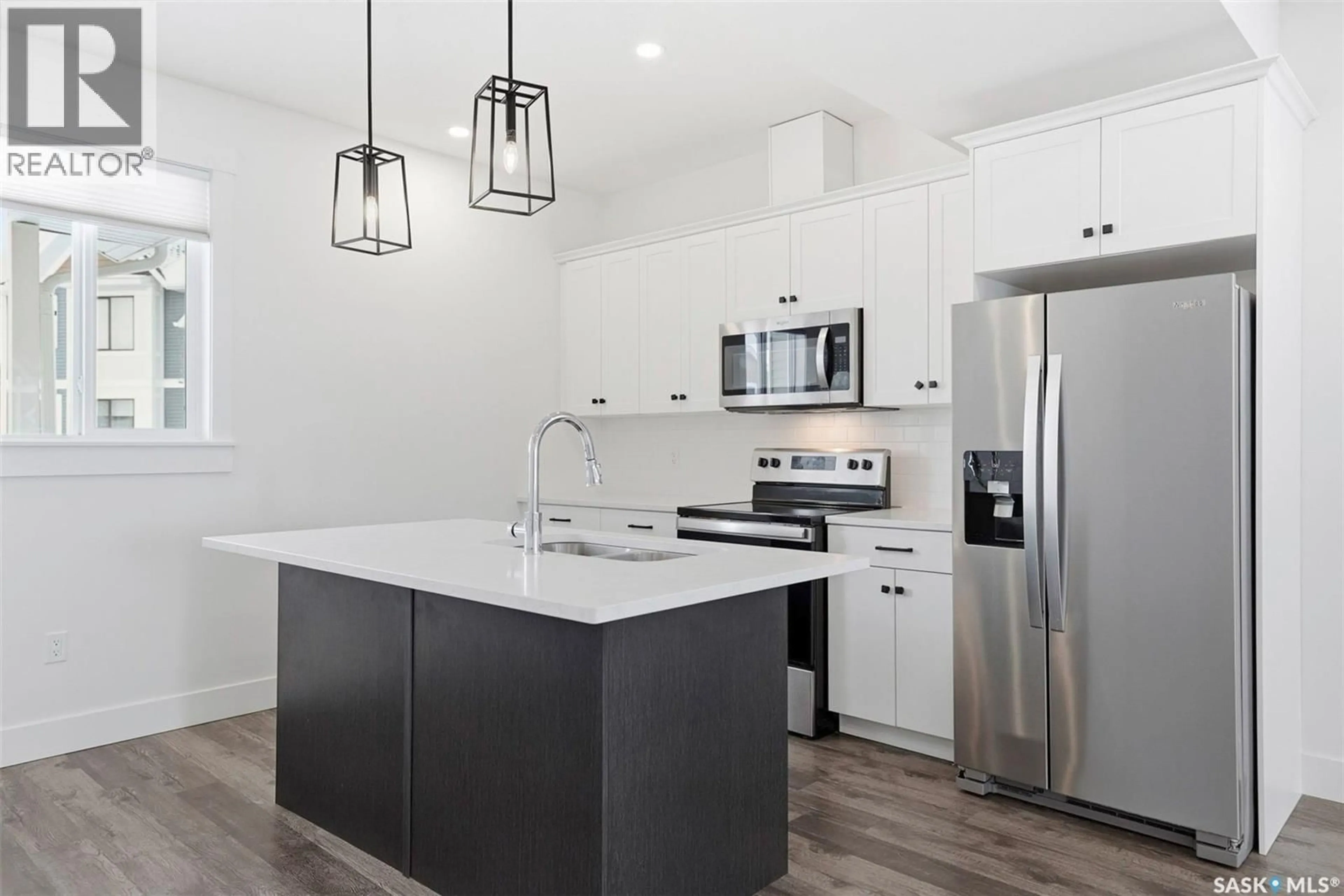 Open concept kitchen, ceramic/tile floor for 47 ST ANDREWS LANE, Warman Saskatchewan S0K4S4