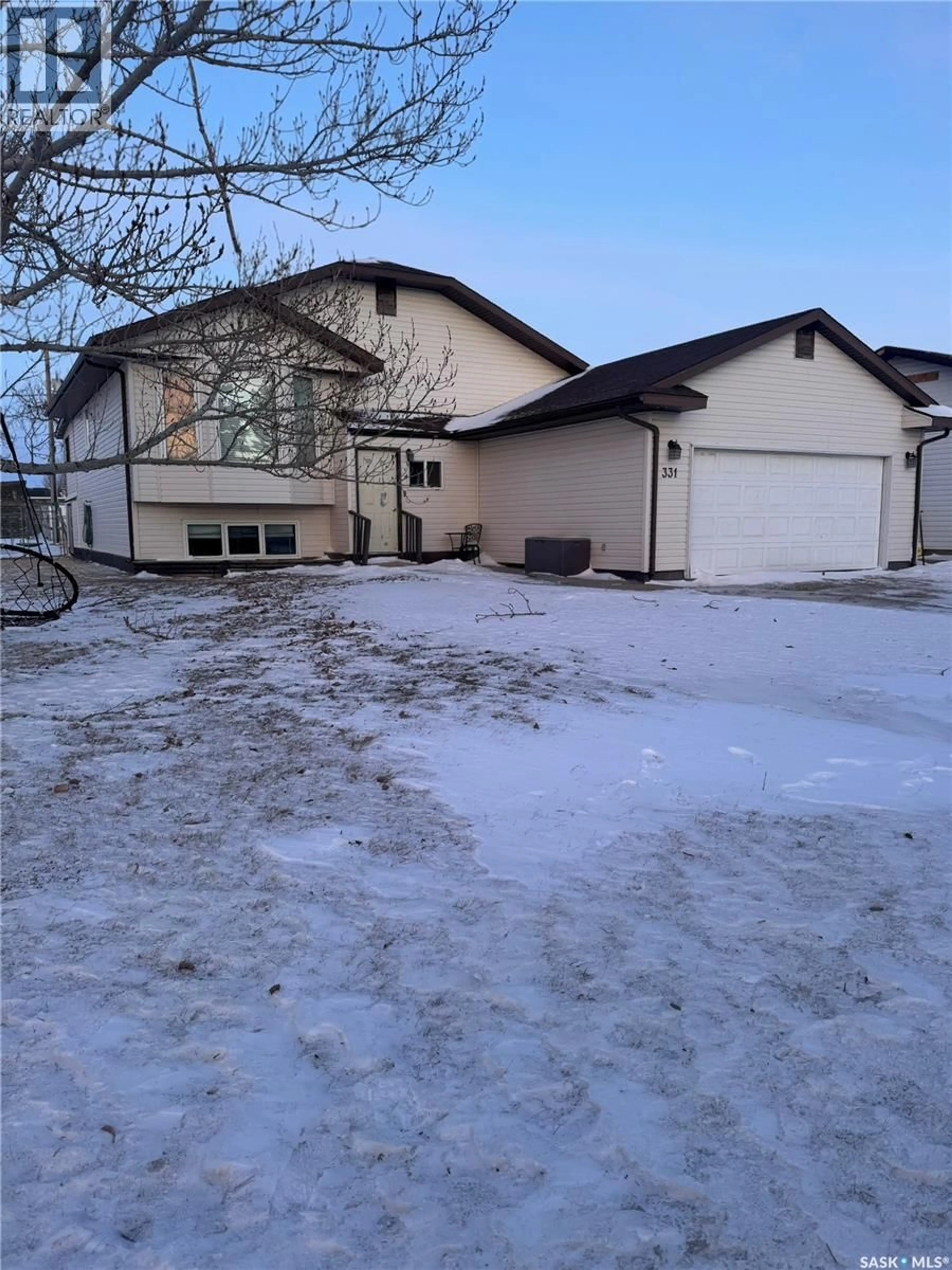 A pic from outside/outdoor area/front of a property/back of a property/a pic from drone, street for 331 4TH STREET, Weyburn Rm No. 67 Saskatchewan S0C1X0