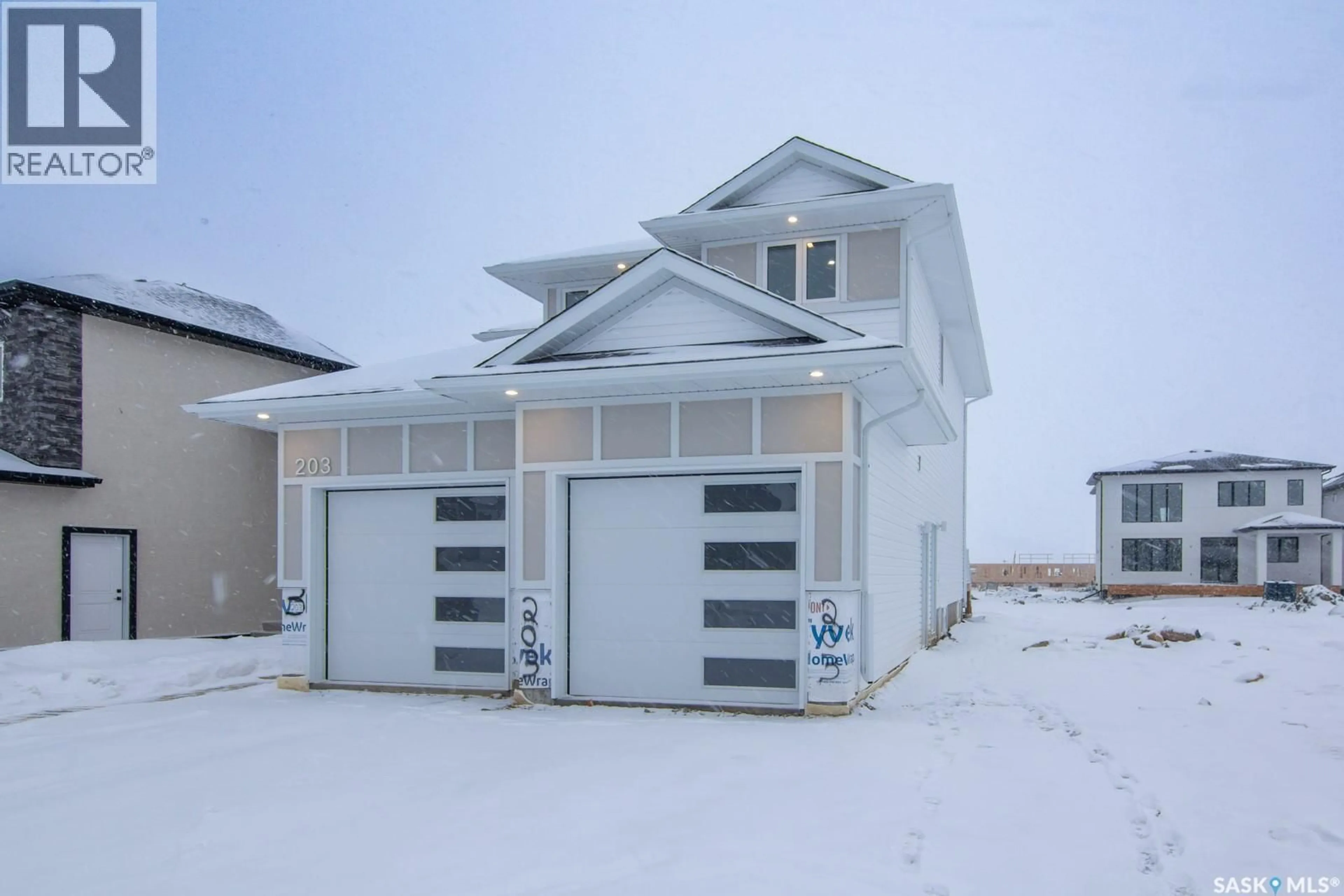 Indoor garage for 203 SHARMA LANE, Saskatoon Saskatchewan S7W0Y4