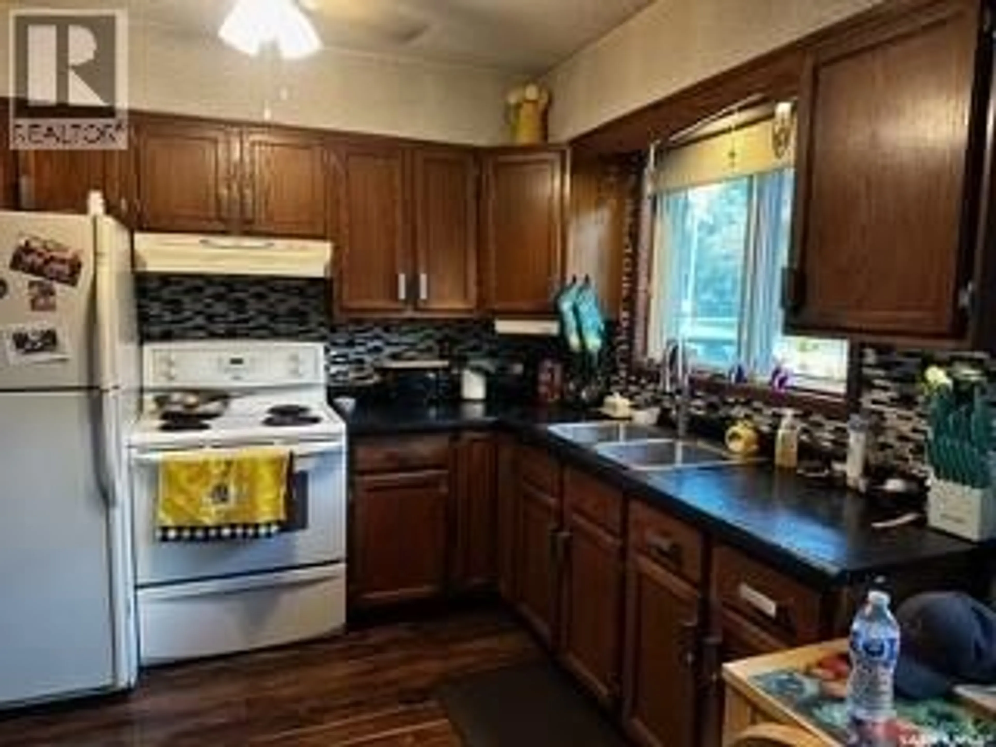Standard kitchen, wood/laminate floor for 110 SOUTH AVENUE E, Hafford Saskatchewan S0J1A0