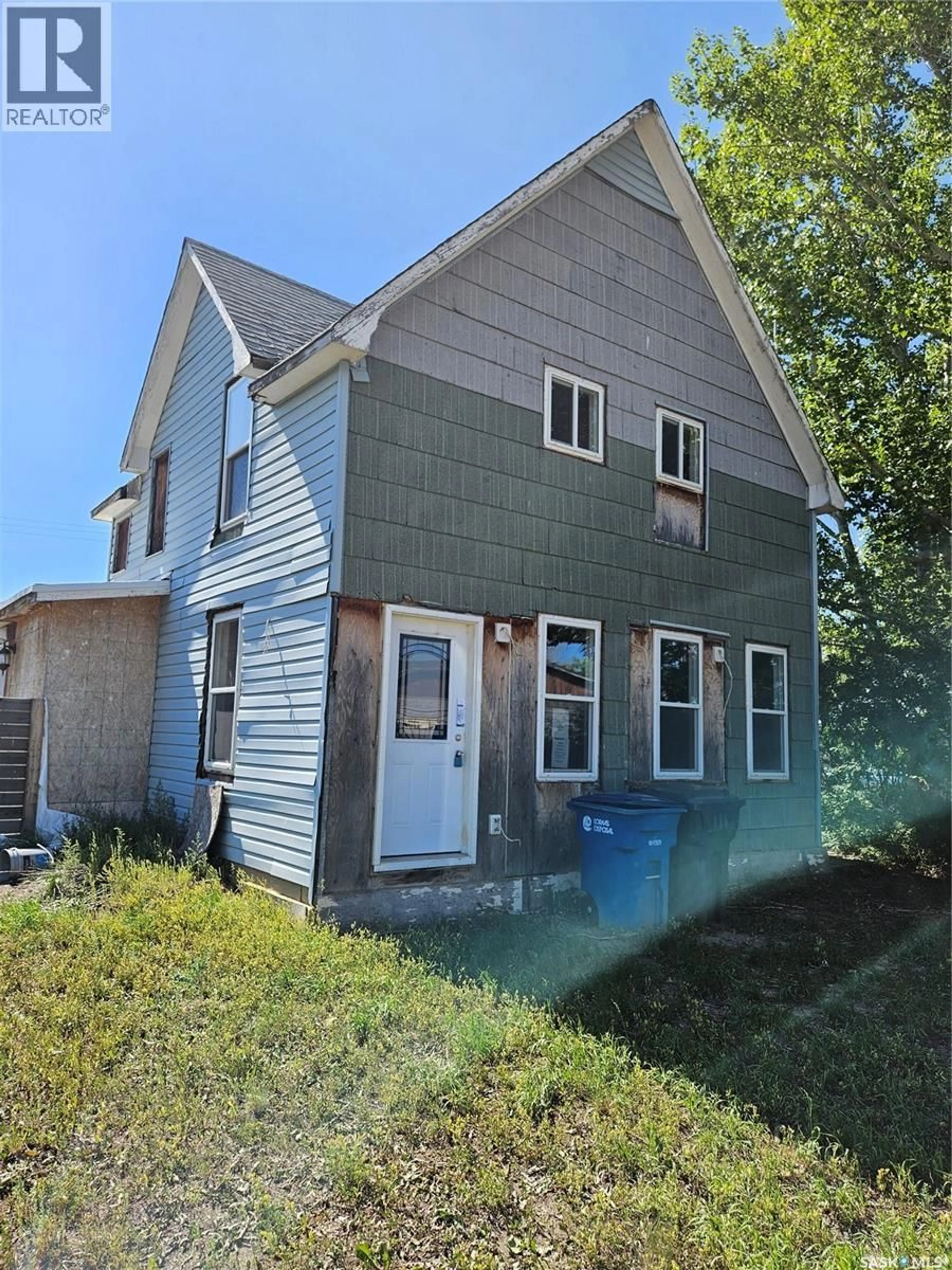 Home with vinyl exterior material, street for 245 ORIOLE AVENUE, Briercrest Saskatchewan S0H0K0