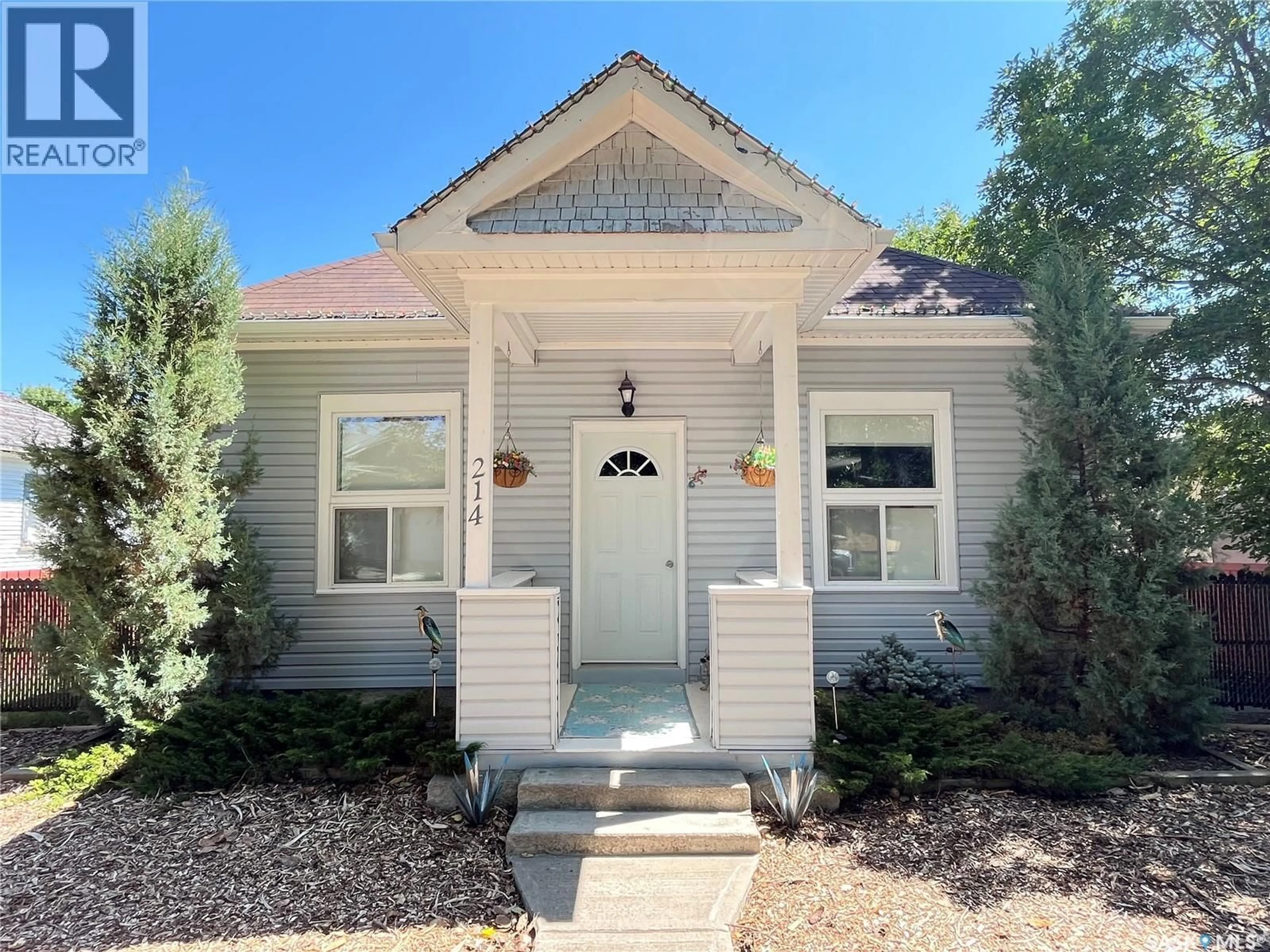 Home with vinyl exterior material, street for 214 MARSH STREET, Maple Creek Saskatchewan S0N1N0