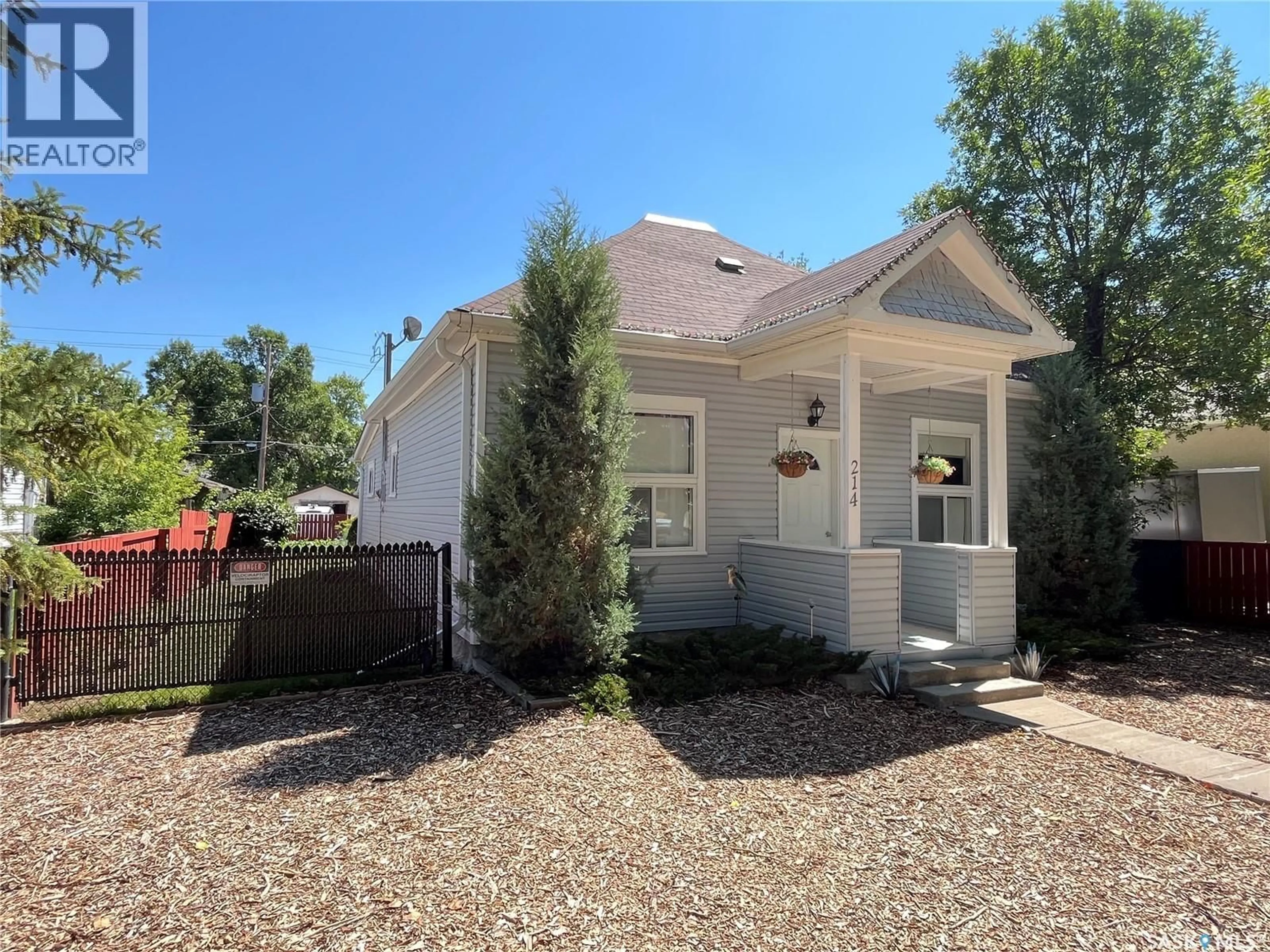 Home with vinyl exterior material, street for 214 MARSH STREET, Maple Creek Saskatchewan S0N1N0