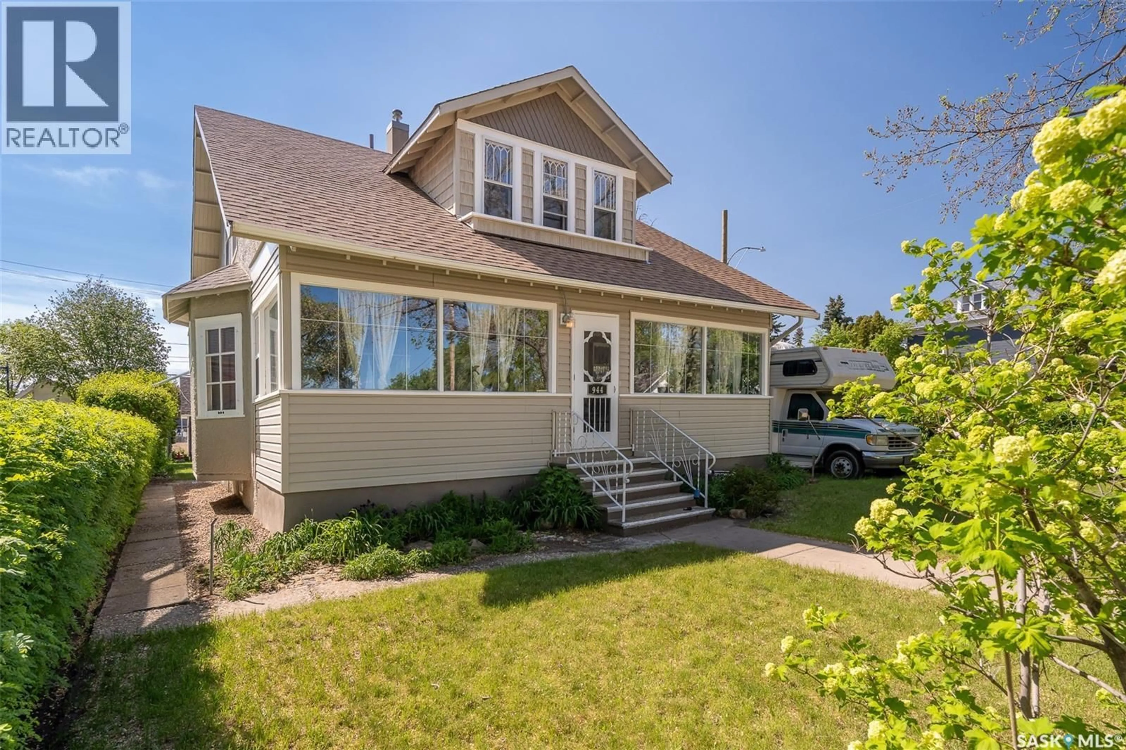 Home with vinyl exterior material, street for 944 ALDER AVENUE, Moose Jaw Saskatchewan S6H0Y1