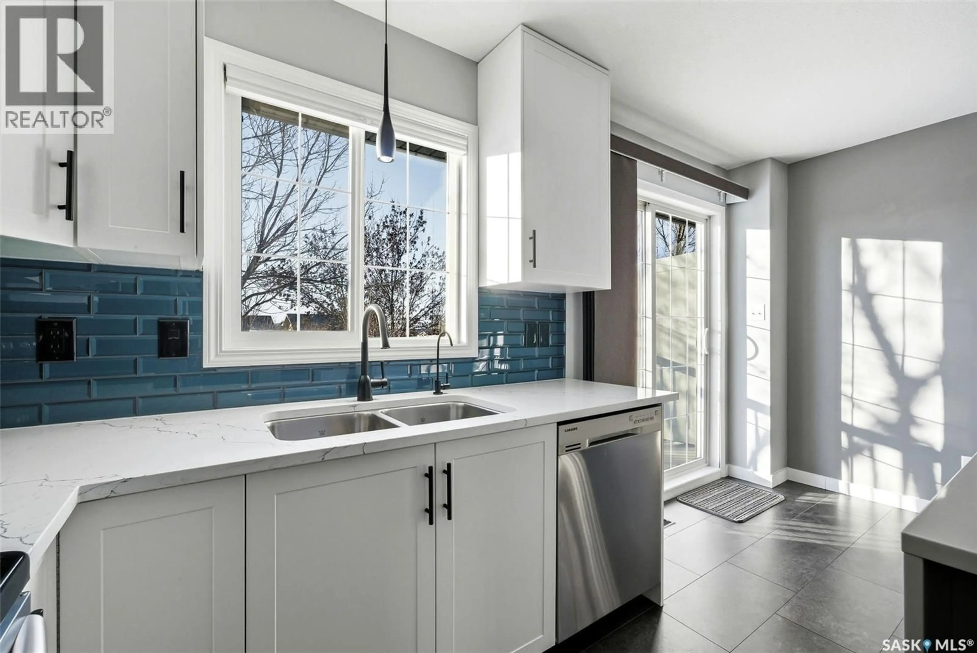Contemporary kitchen, ceramic/tile floor for E - 3826 CORMORANT DRIVE, Regina Saskatchewan S4N7R8