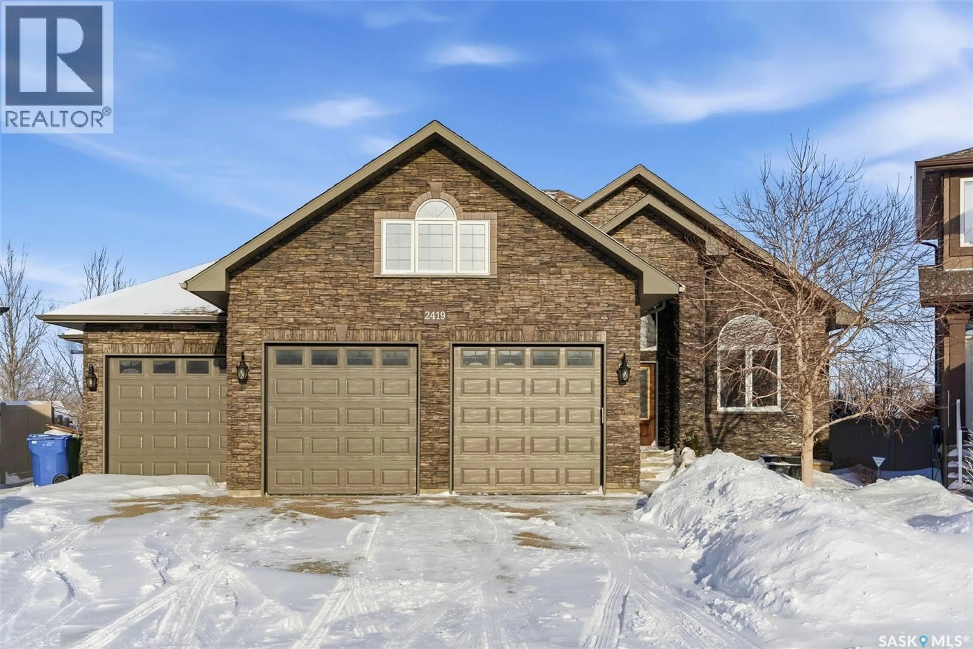 Home with brick exterior material, street for 2419 JAMESON CRESCENT, Regina Saskatchewan S4V1K2