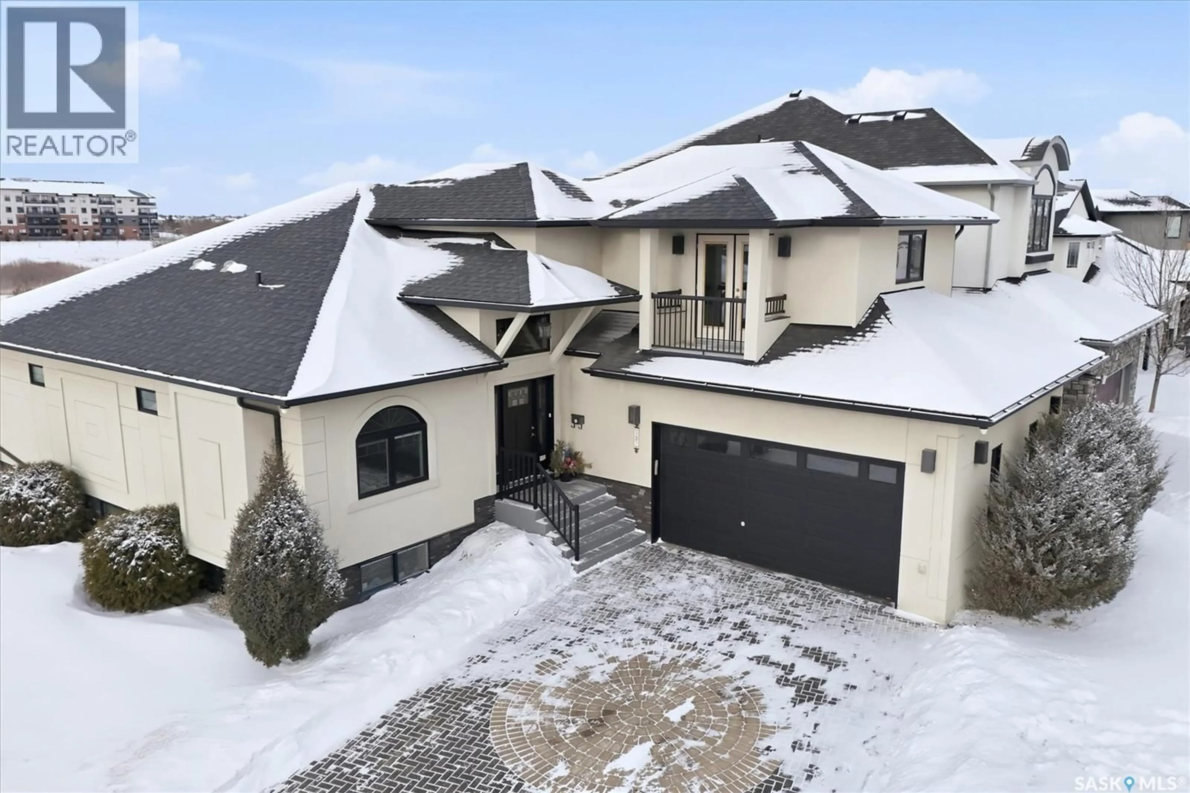 A pic from outside/outdoor area/front of a property/back of a property/a pic from drone, street for 327 HASTINGS LANE, Saskatoon Saskatchewan S7V0C8