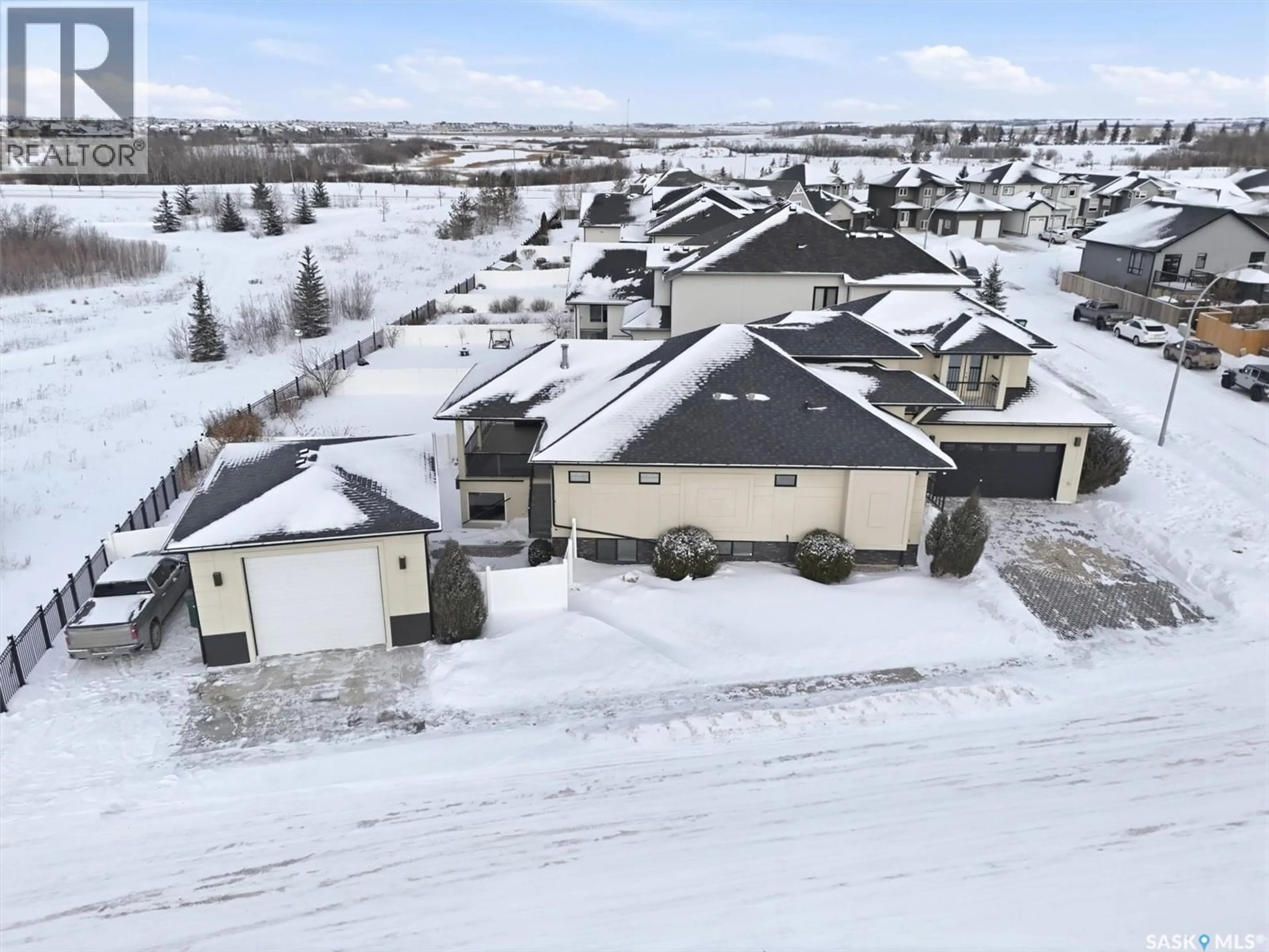 A pic from outside/outdoor area/front of a property/back of a property/a pic from drone, street for 327 HASTINGS LANE, Saskatoon Saskatchewan S7V0C8