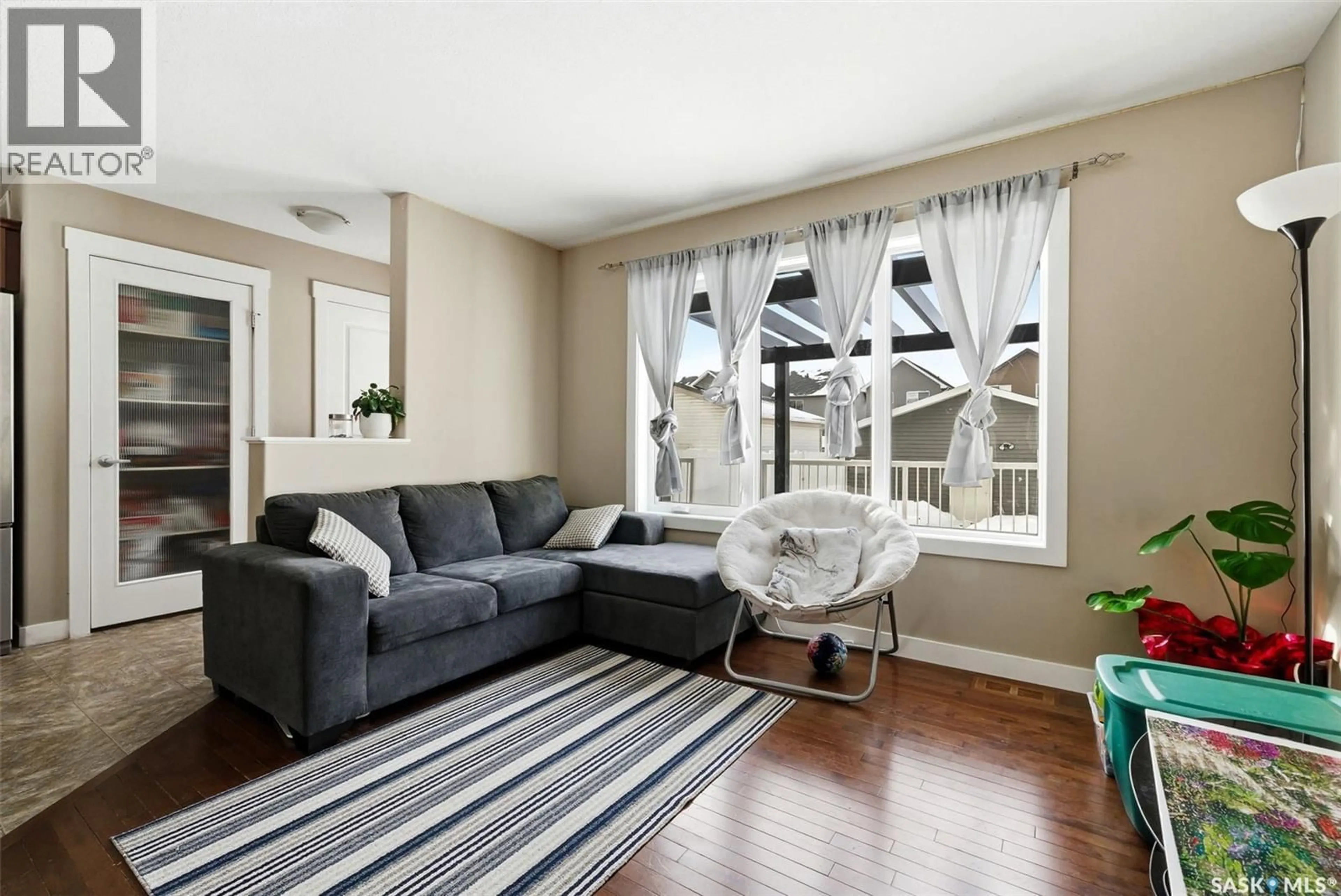 Living room with furniture, unknown for 3669 GREEN BANK ROAD, Regina Saskatchewan S4V1M2