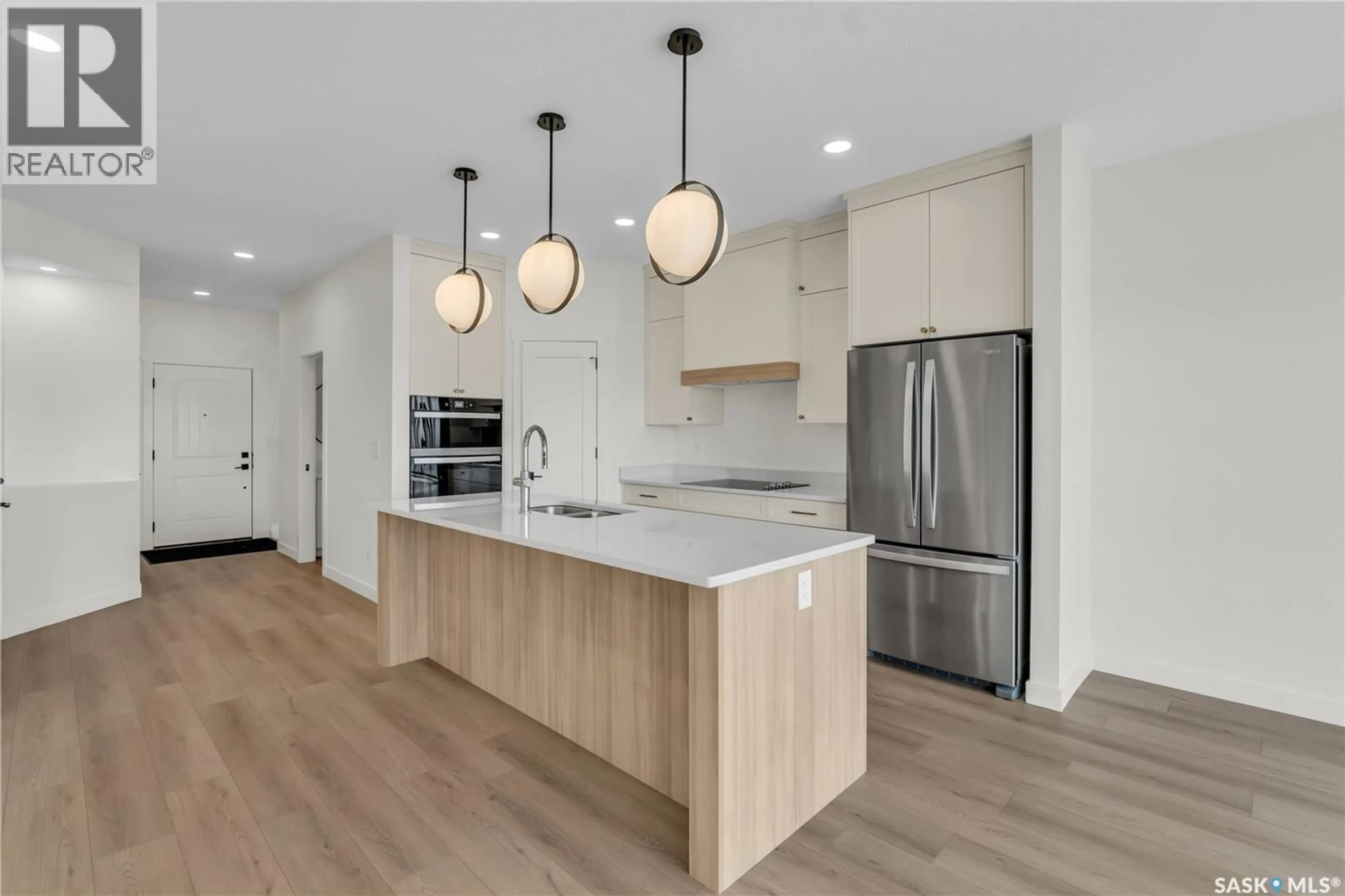 Open concept kitchen, unknown for 22 720 BRIGHTON BOULEVARD, Saskatoon Saskatchewan S7V1X1