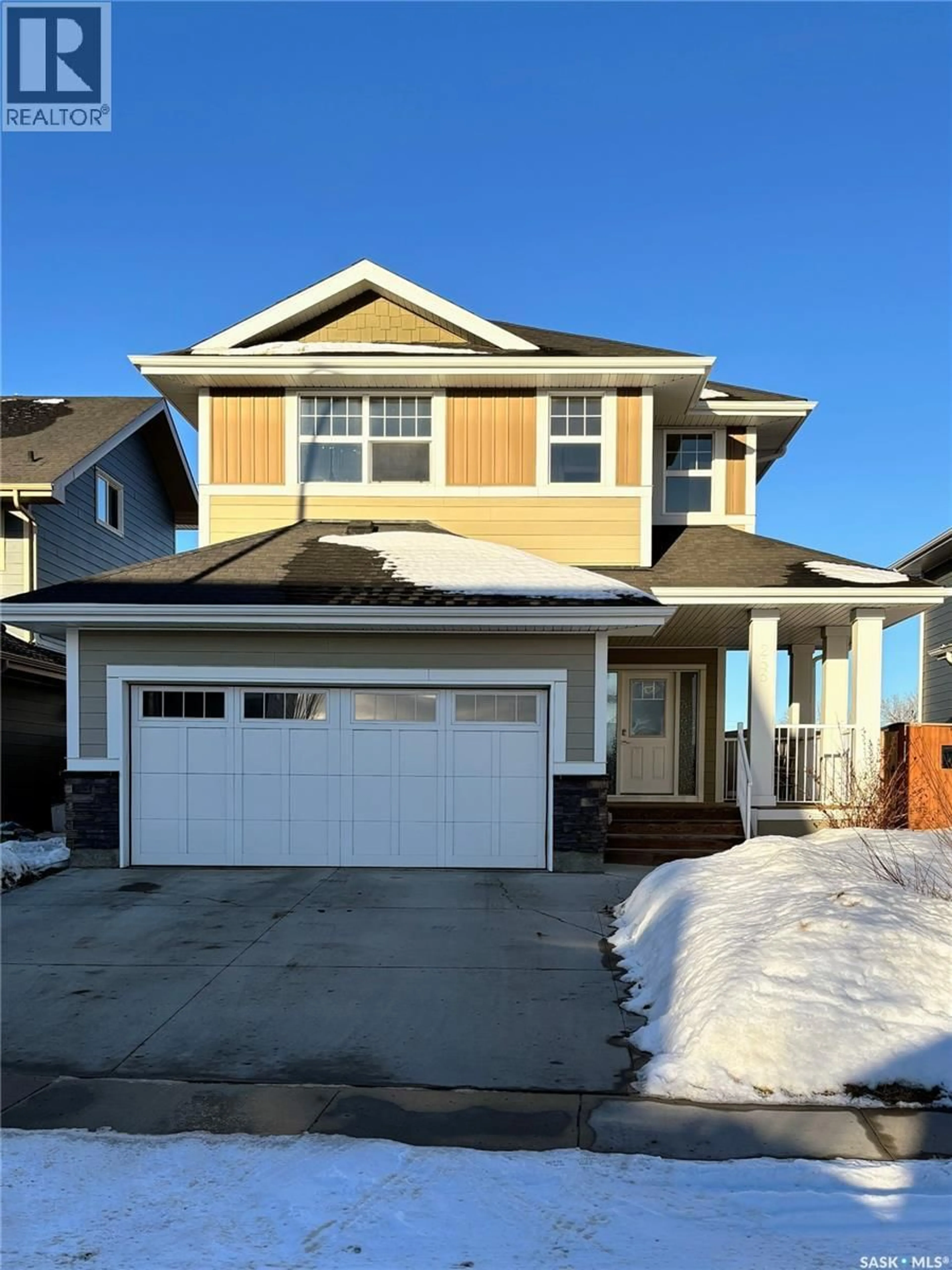 Home with vinyl exterior material, street for 255 EATON CRESCENT, Saskatoon Saskatchewan S7V0H3