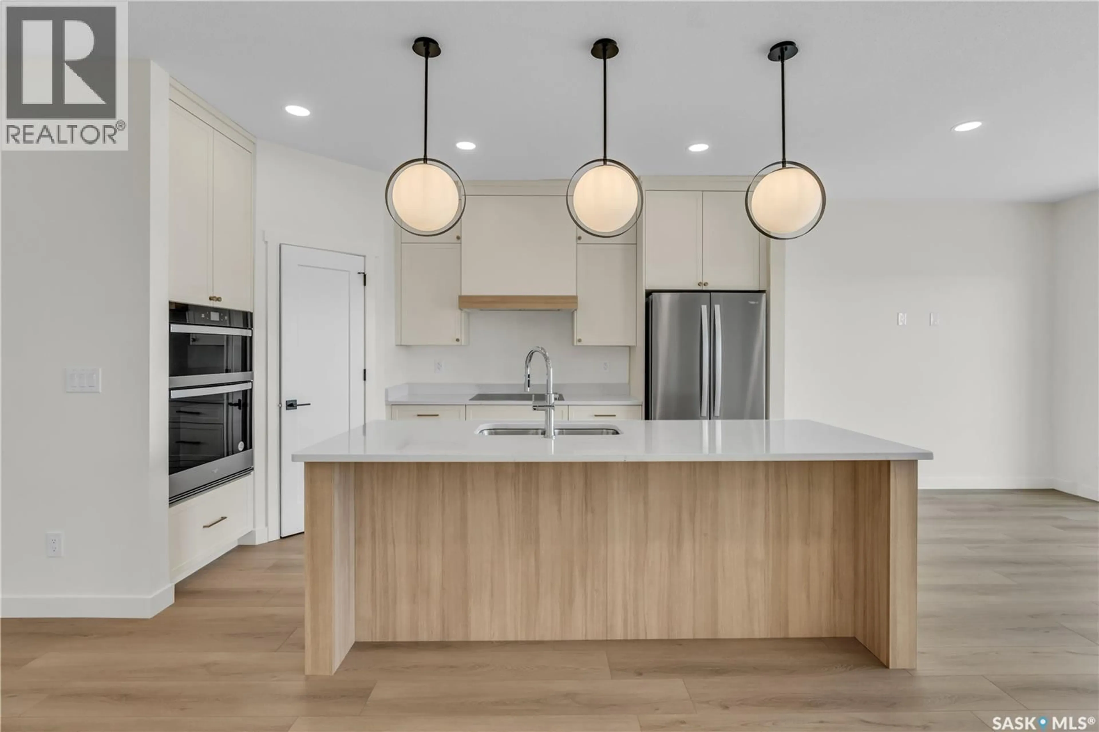 Open concept kitchen, unknown for 4 BRIGHTON BOULEVARD, Saskatoon Saskatchewan S7V1X1