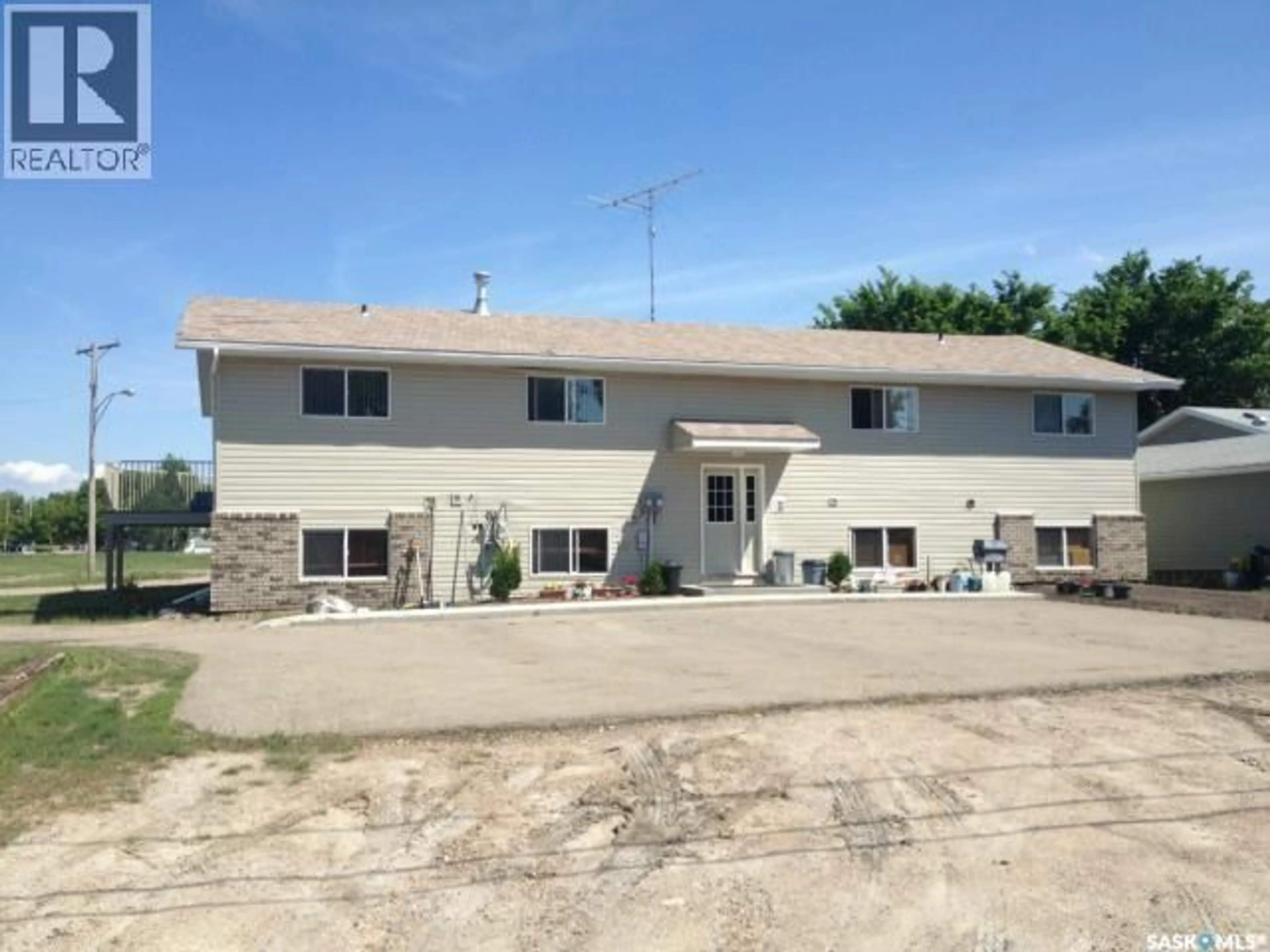 A pic from outside/outdoor area/front of a property/back of a property/a pic from drone, building for 245 3RD STREET, Wadena Saskatchewan S0A4J0