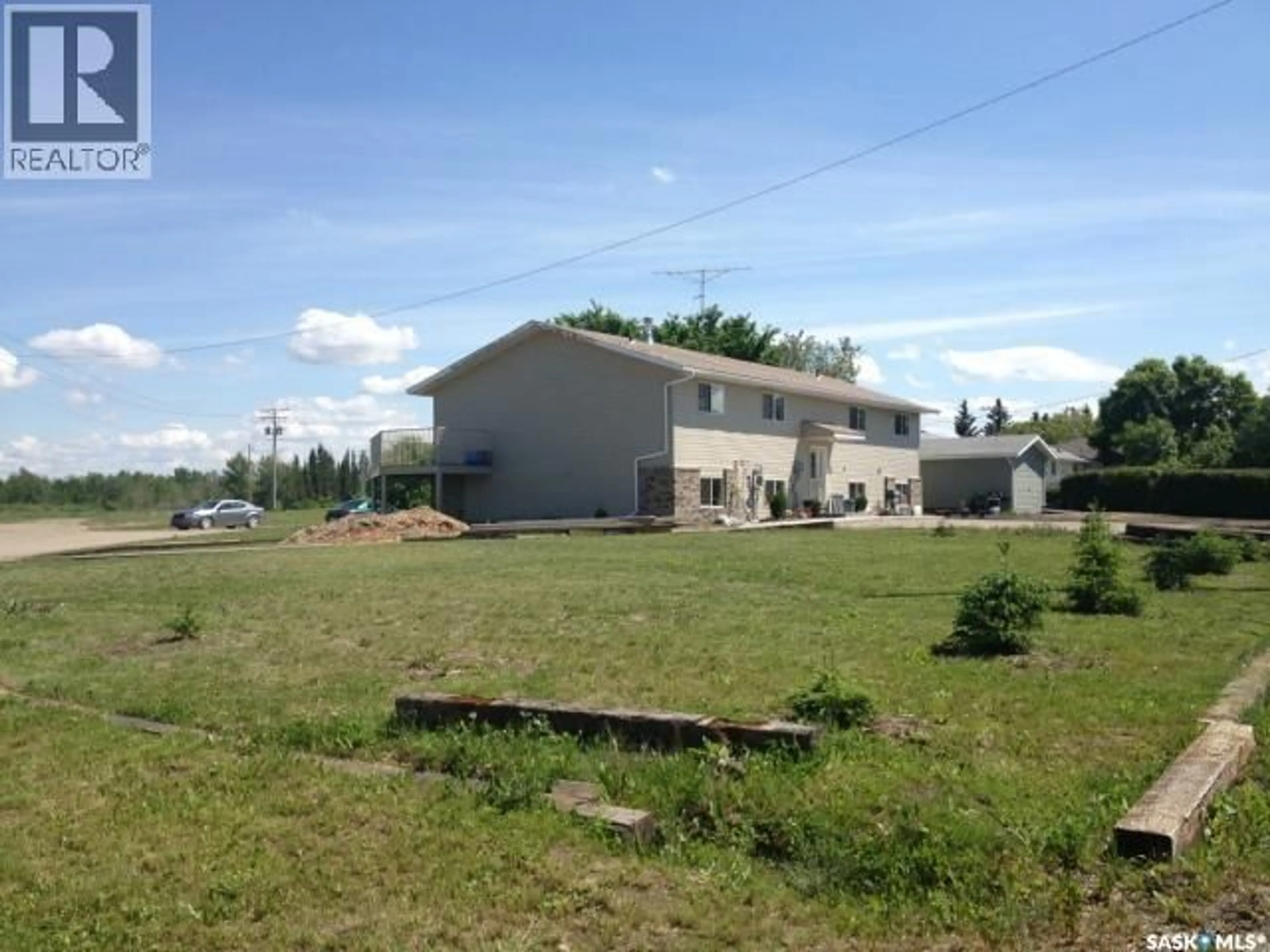A pic from outside/outdoor area/front of a property/back of a property/a pic from drone, building for 245 3RD STREET, Wadena Saskatchewan S0A4J0