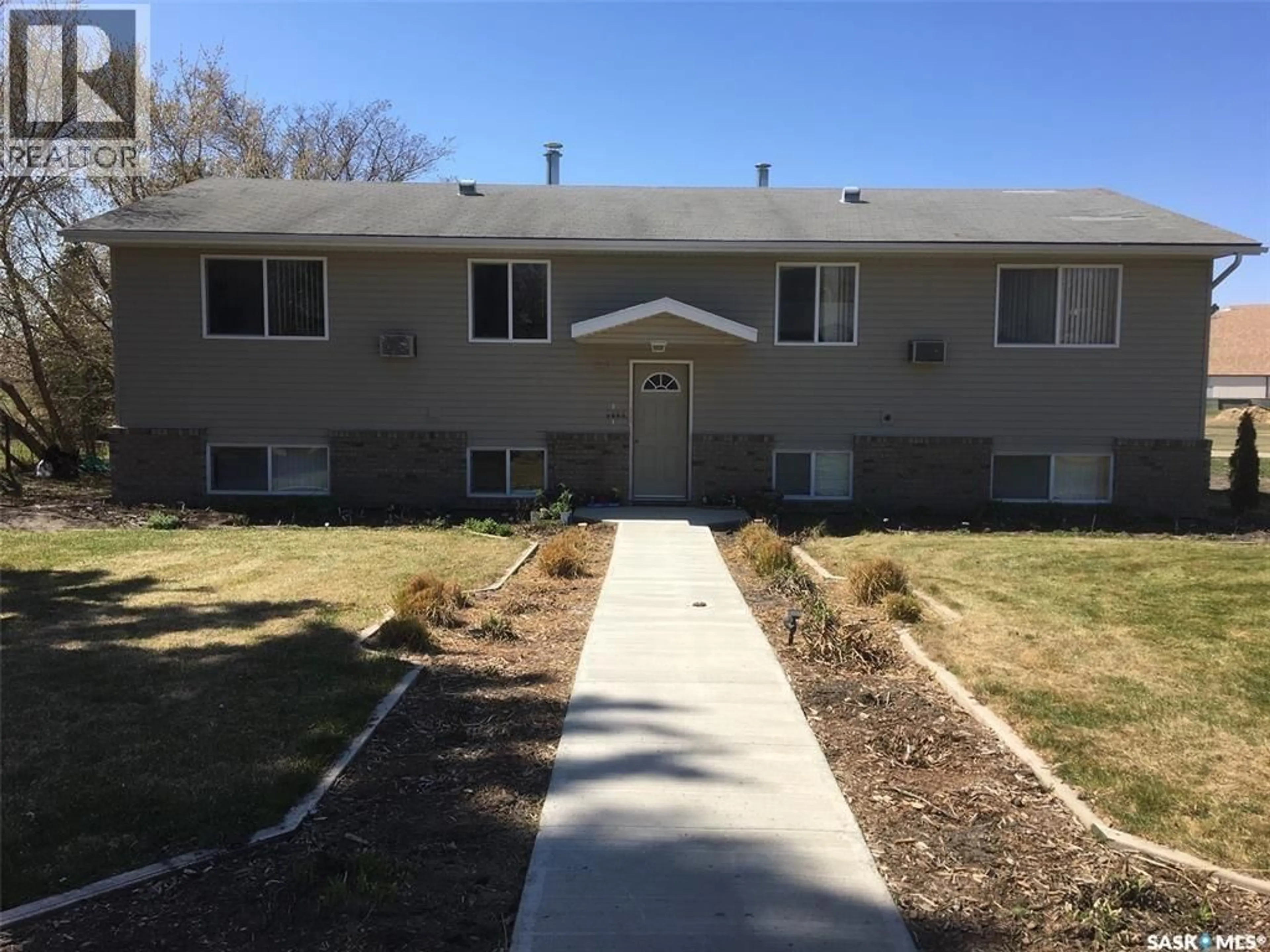 Home with vinyl exterior material, street for 89 HORKOFF AVENUE, Wadena Saskatchewan S0A4J0