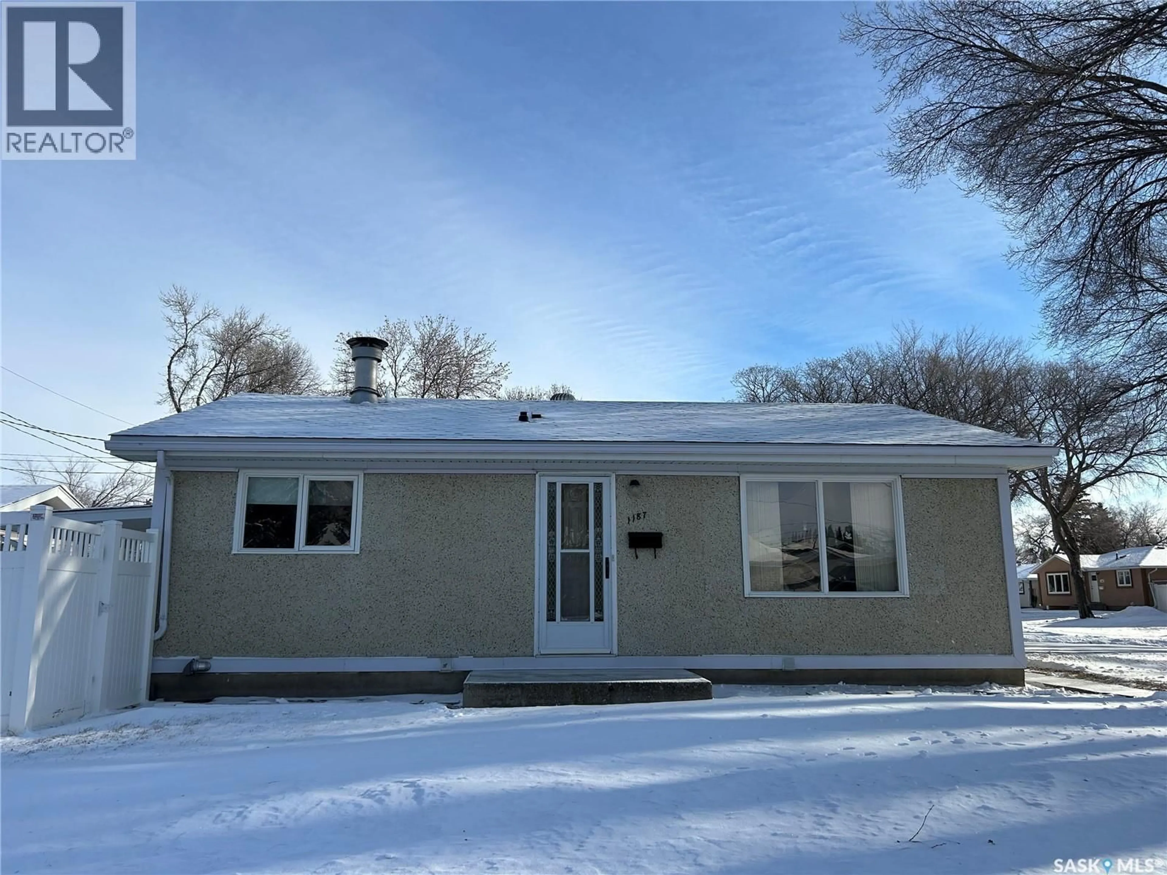 Home with vinyl exterior material, street for 1187 CURRIE CRESCENT, Moose Jaw Saskatchewan S6H5M9