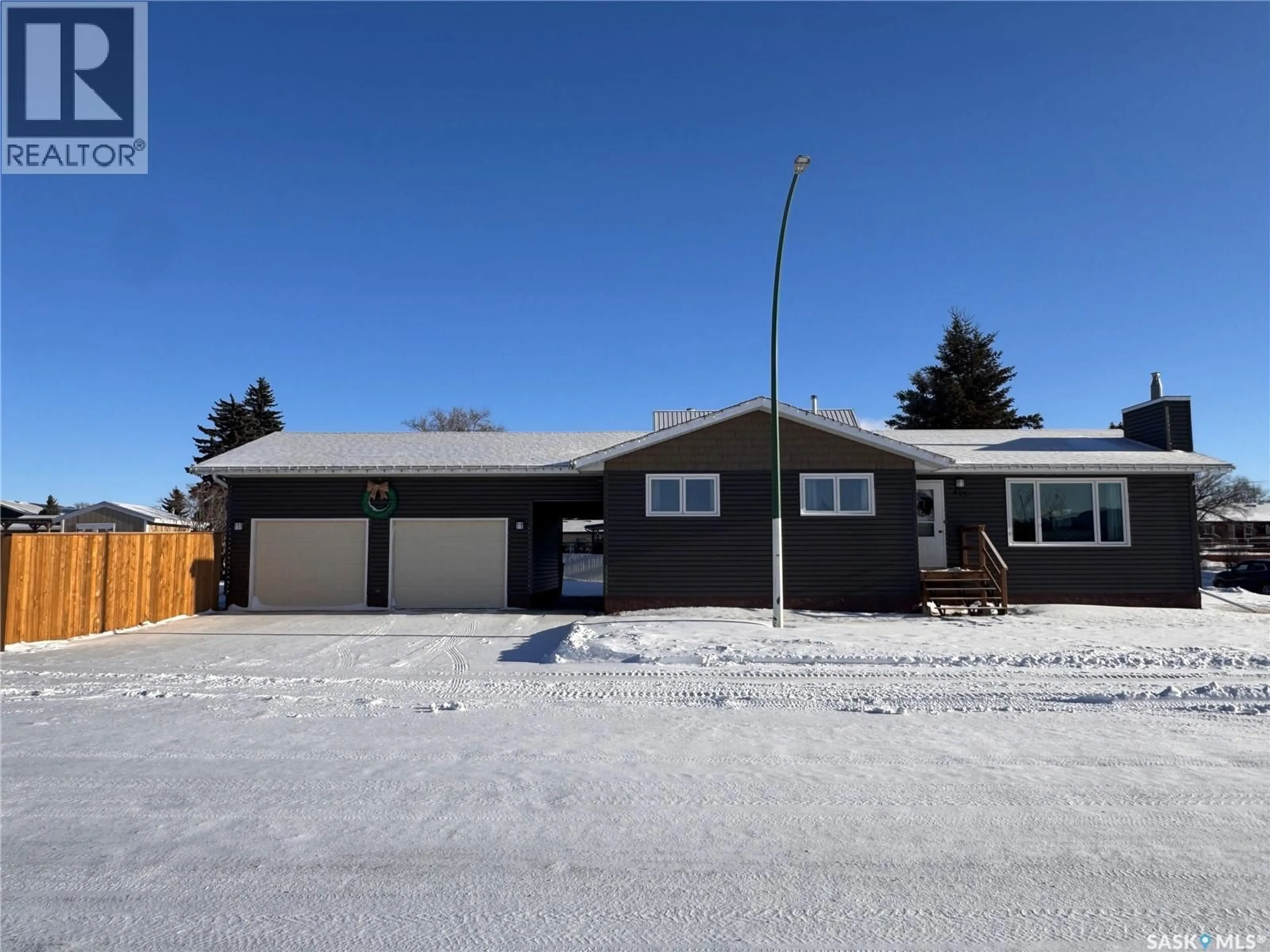 A pic from outside/outdoor area/front of a property/back of a property/a pic from drone, street for 415 3RD AVENUE, Biggar Saskatchewan S0K0M0