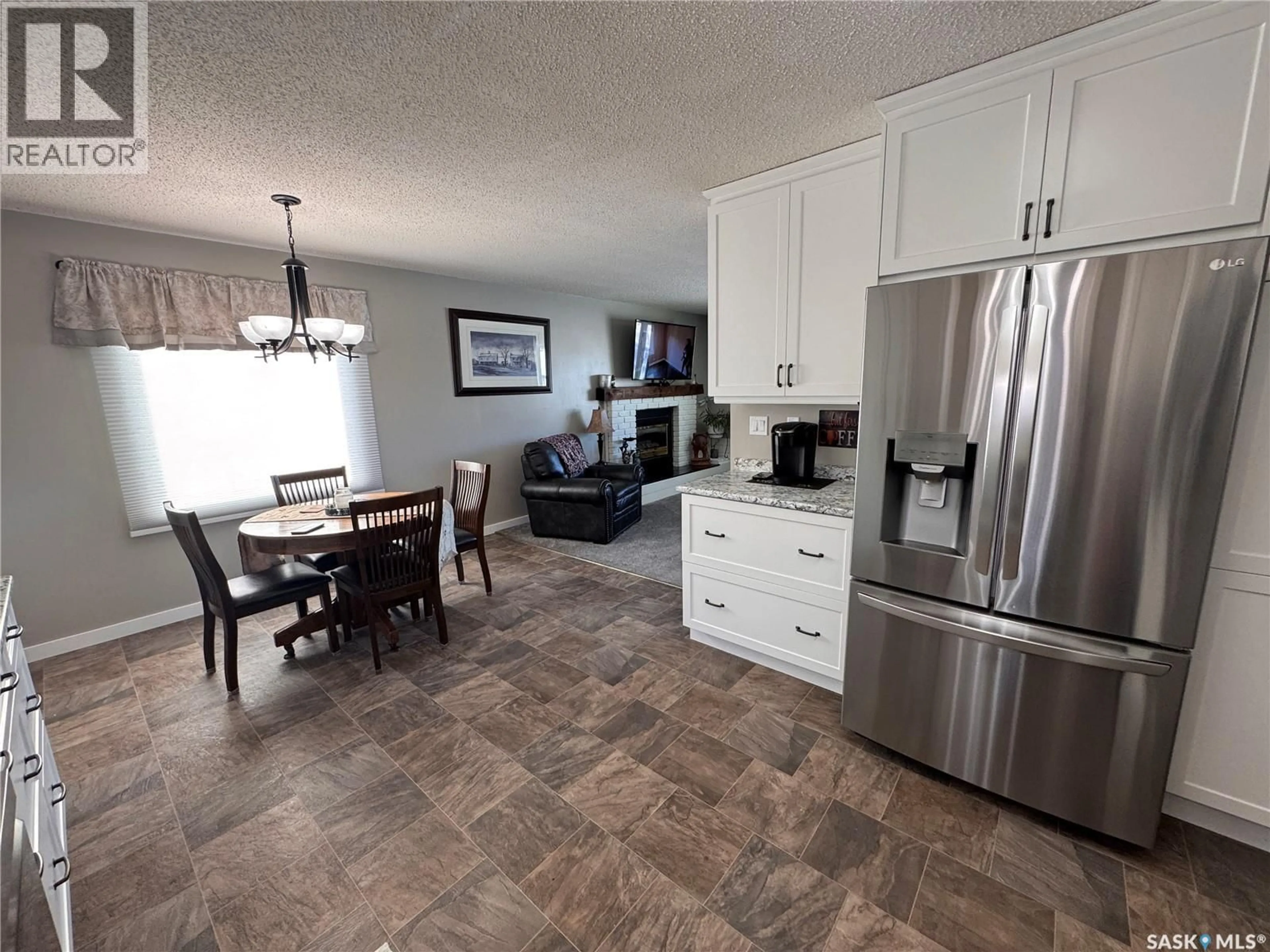 Open concept kitchen, ceramic/tile floor for 415 3RD AVENUE, Biggar Saskatchewan S0K0M0