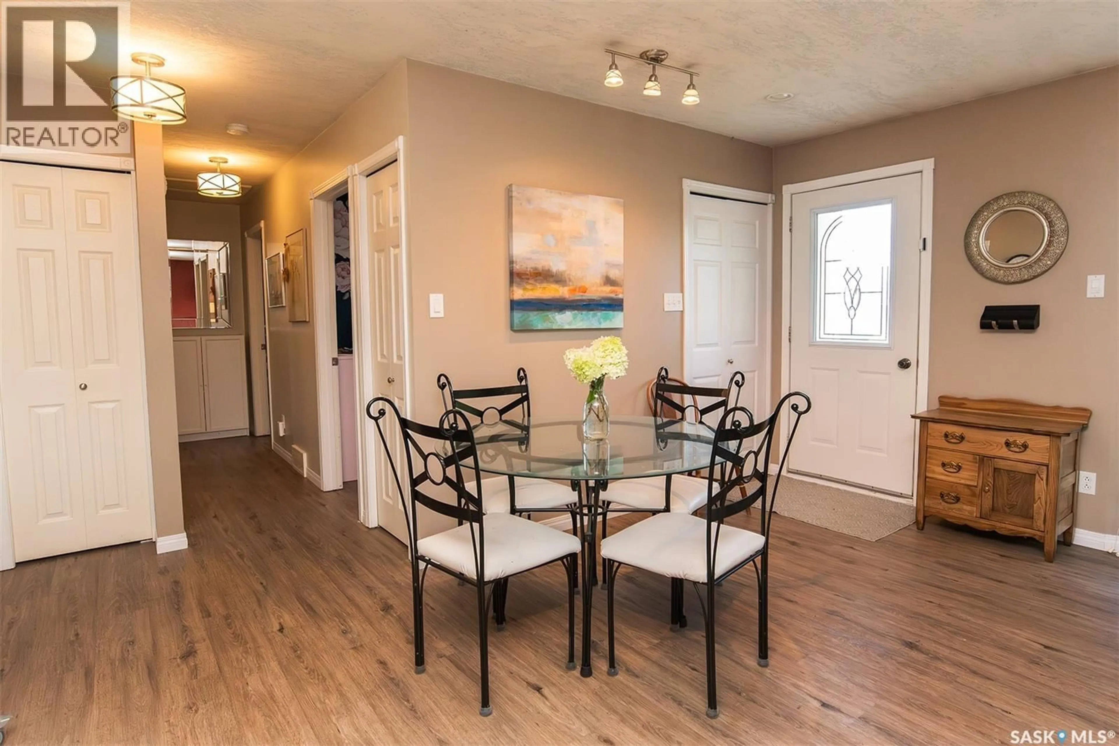 Dining room, wood/laminate floor for 203 BROOKDALE PLACE, Wynyard Saskatchewan S0A4T0