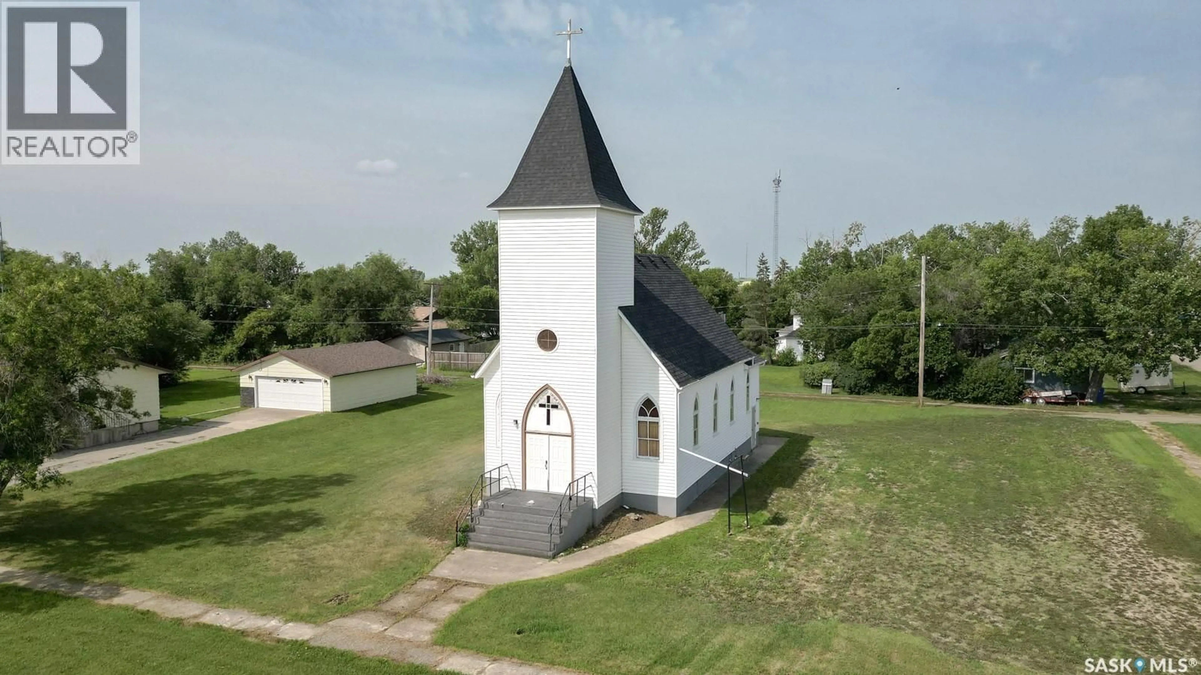 A pic from outside/outdoor area/front of a property/back of a property/a pic from drone, building for 229 VICTORIA STREET, Lang Saskatchewan S0G2W0