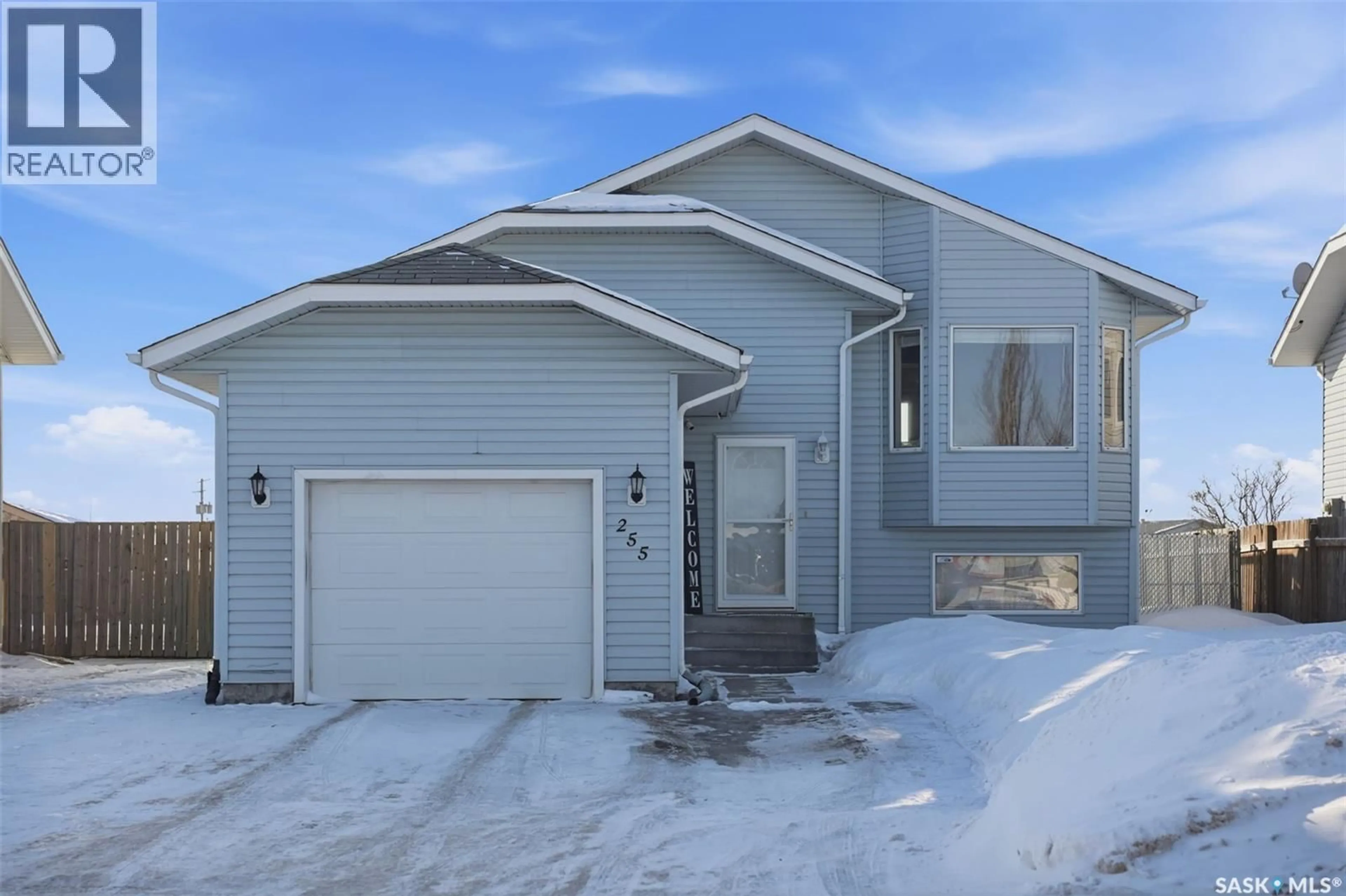 Home with vinyl exterior material, street for 255 SOUTHWOOD DRIVE, Prince Albert Saskatchewan S6V8E7