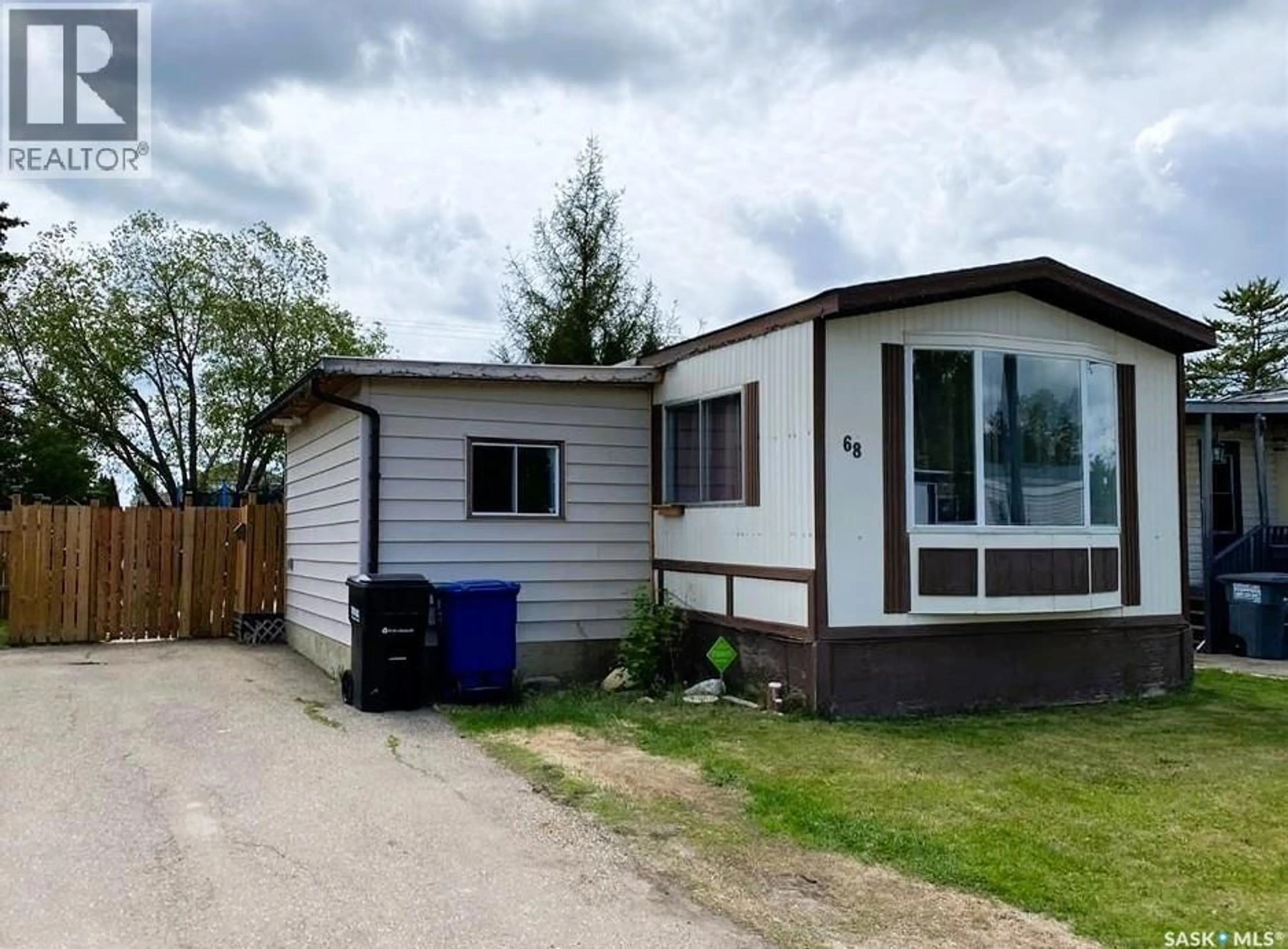 Home with vinyl exterior material, street for 1035 - 68 BOYCHUK DRIVE, Saskatoon Saskatchewan S7H5B2