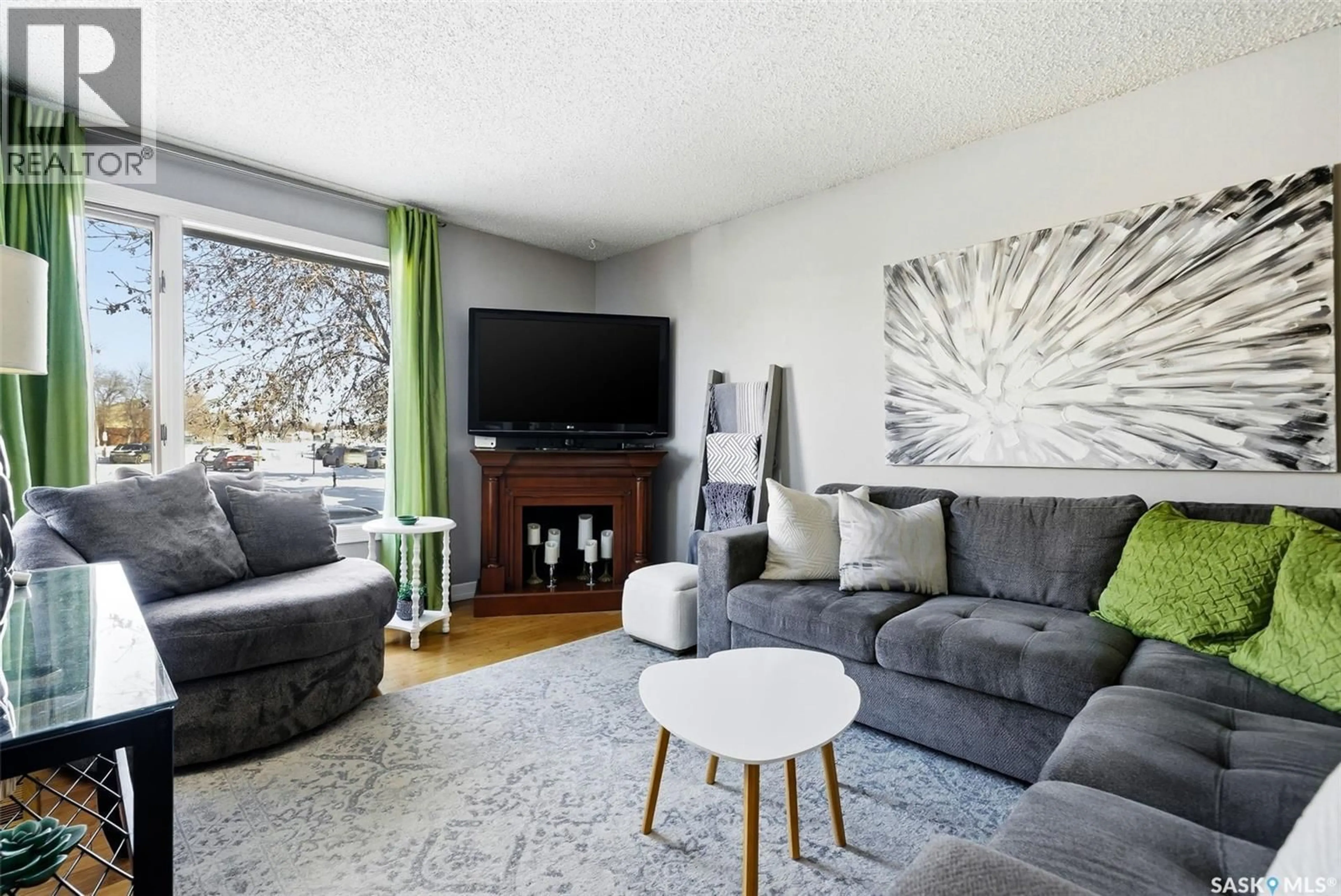 Living room with furniture, unknown for 387 FINES DRIVE, Regina Saskatchewan S4N5T3