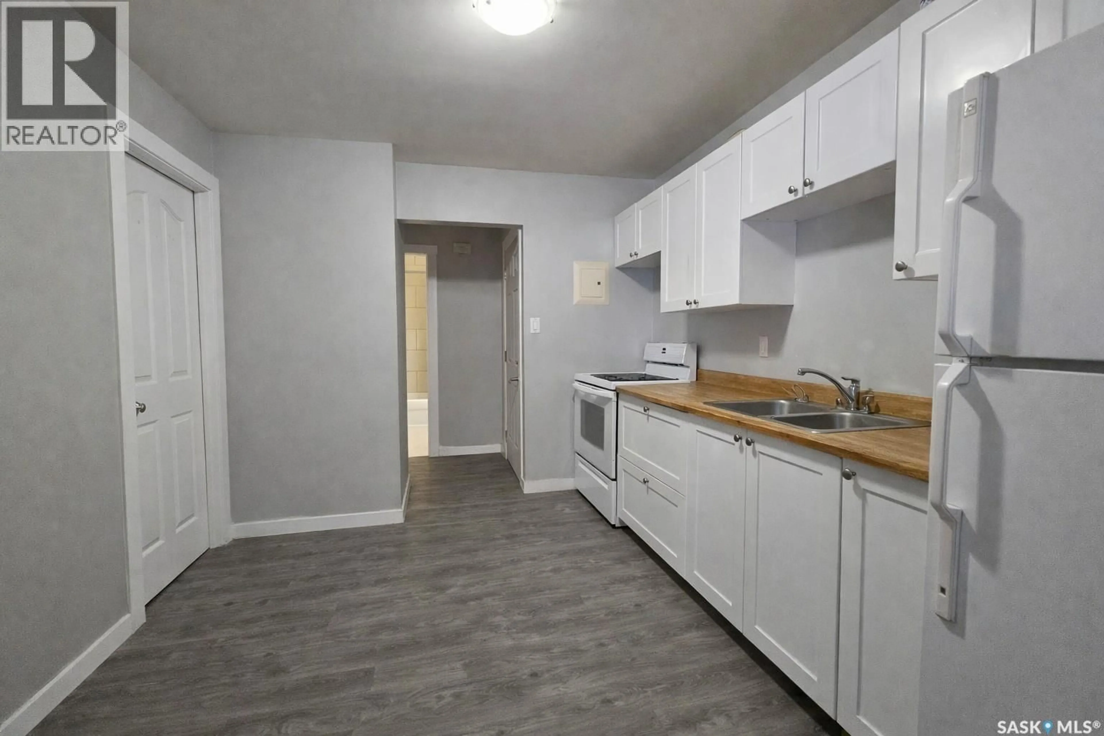 Standard kitchen, wood/laminate floor for 1411 111TH STREET, North Battleford Saskatchewan S9A2K7