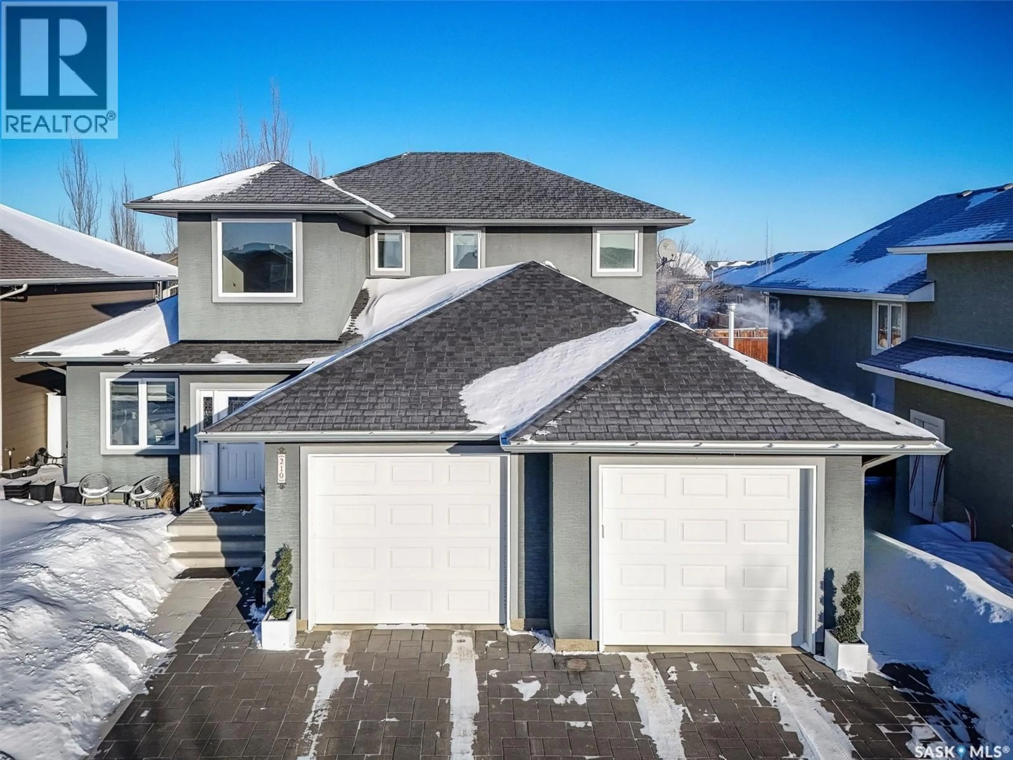 A pic from outside/outdoor area/front of a property/back of a property/a pic from drone, street for 210 CLUBHOUSE BOULEVARD, Warman Saskatchewan S0K4S1