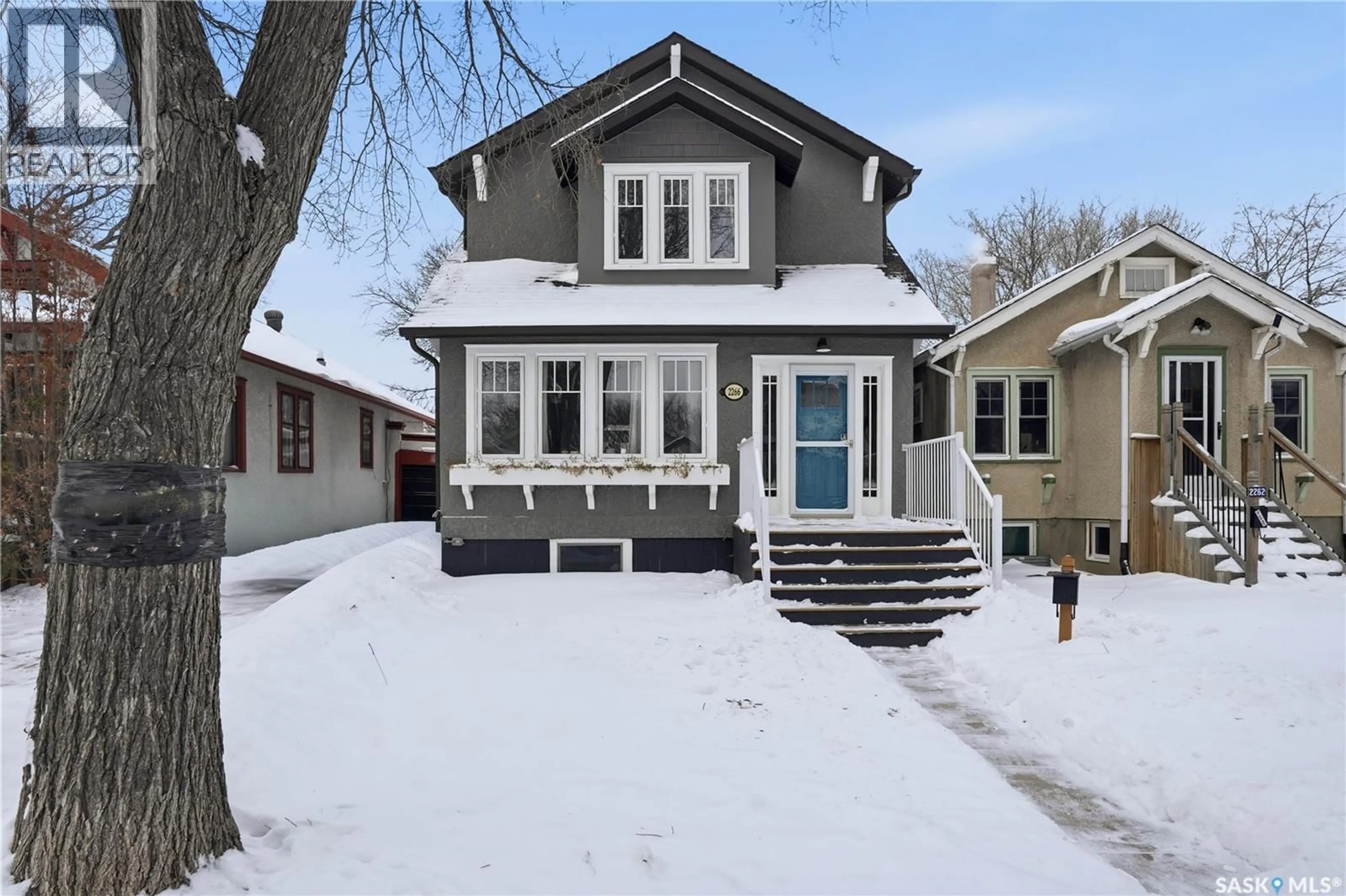 Home with vinyl exterior material, street for 2266 QUEBEC STREET, Regina Saskatchewan S4P1K2