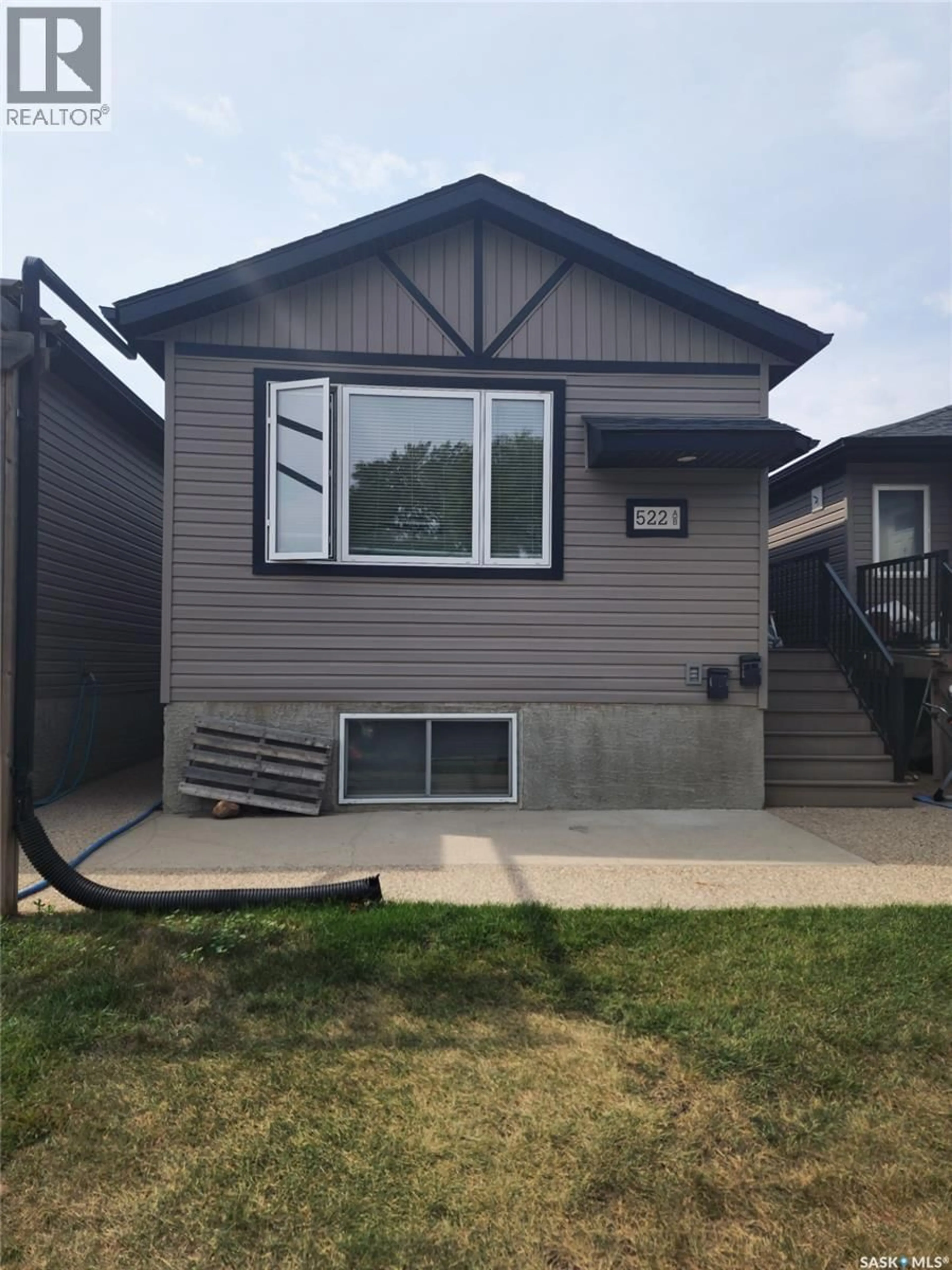 Home with vinyl exterior material, street for 522 TORONTO STREET, Regina Saskatchewan S4R1M6