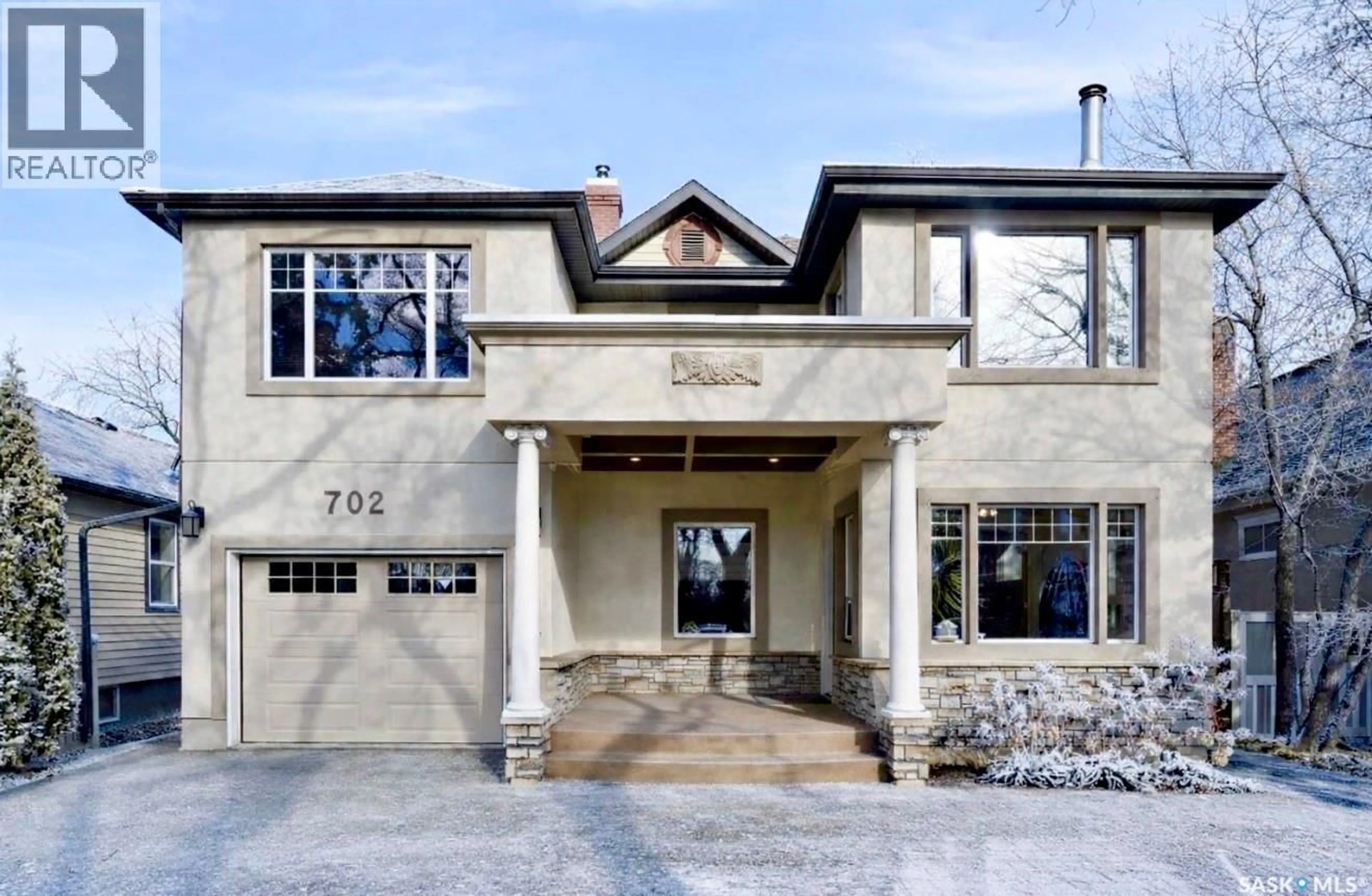 Home with brick exterior material, street for 702 QUEEN STREET, Saskatoon Saskatchewan S7K0M9