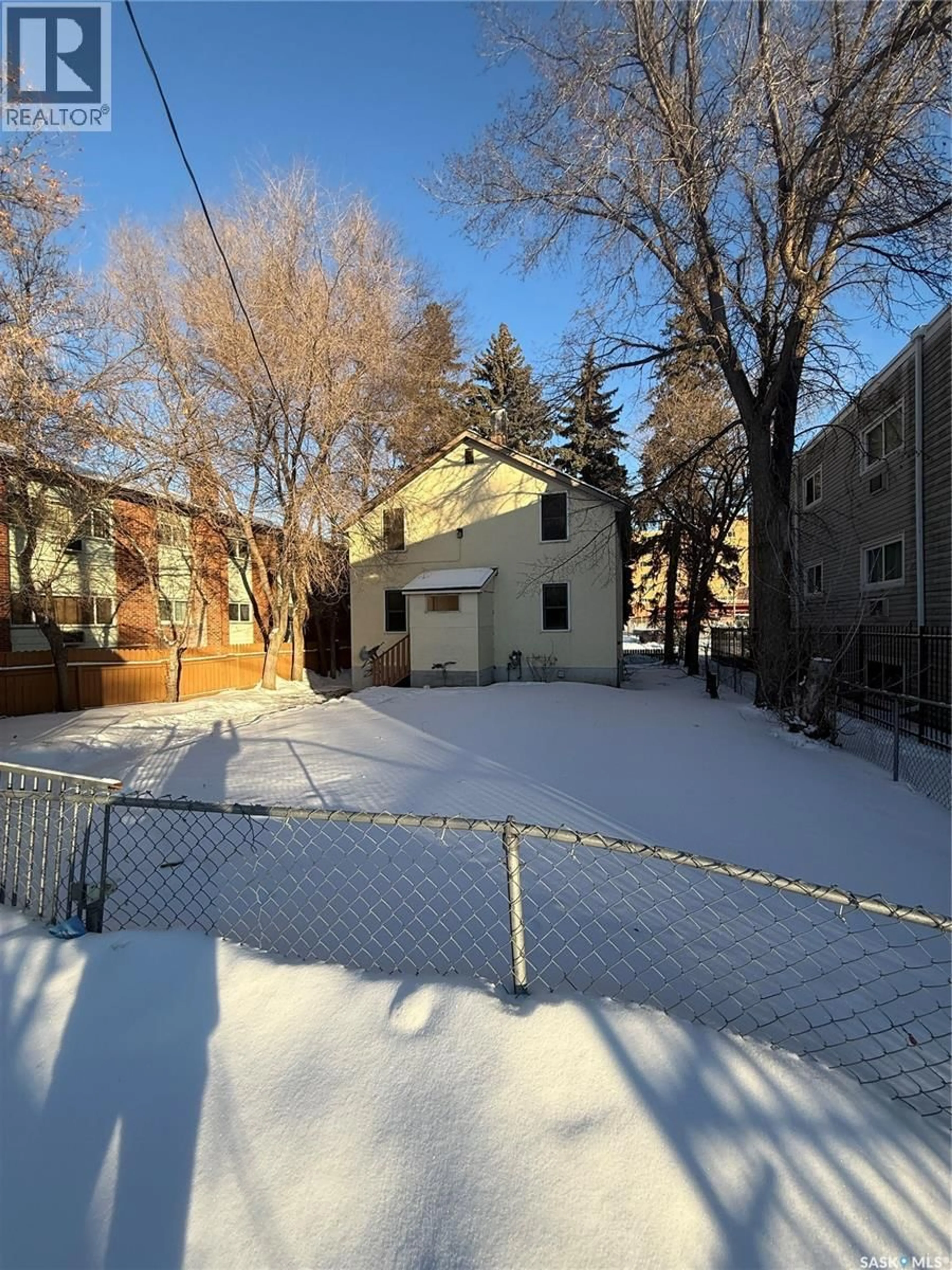 A pic from outside/outdoor area/front of a property/back of a property/a pic from drone, street for 1705 20TH STREET, Saskatoon Saskatchewan S7M0Z8