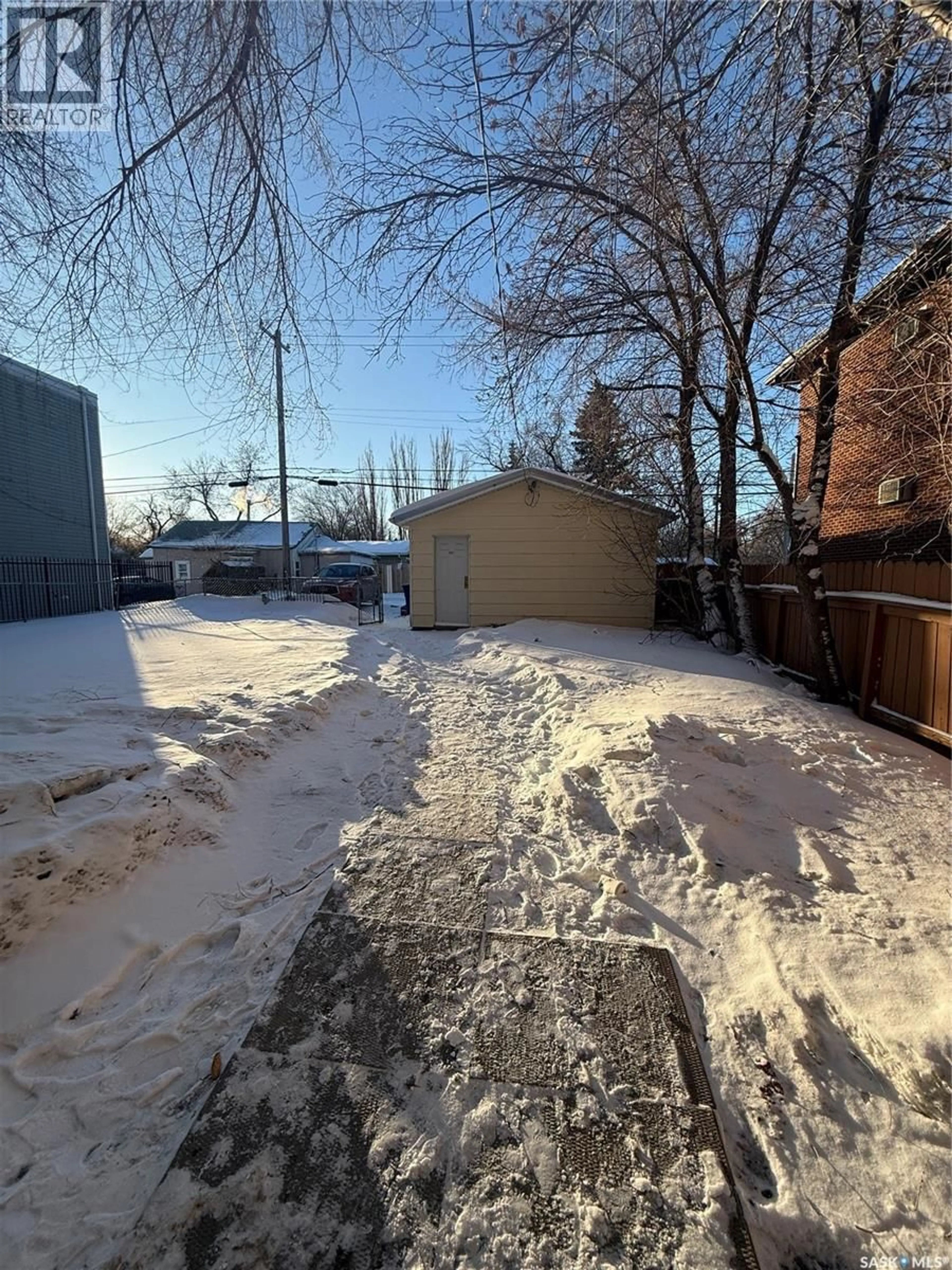 A pic from outside/outdoor area/front of a property/back of a property/a pic from drone, street for 1705 20TH STREET, Saskatoon Saskatchewan S7M0Z8