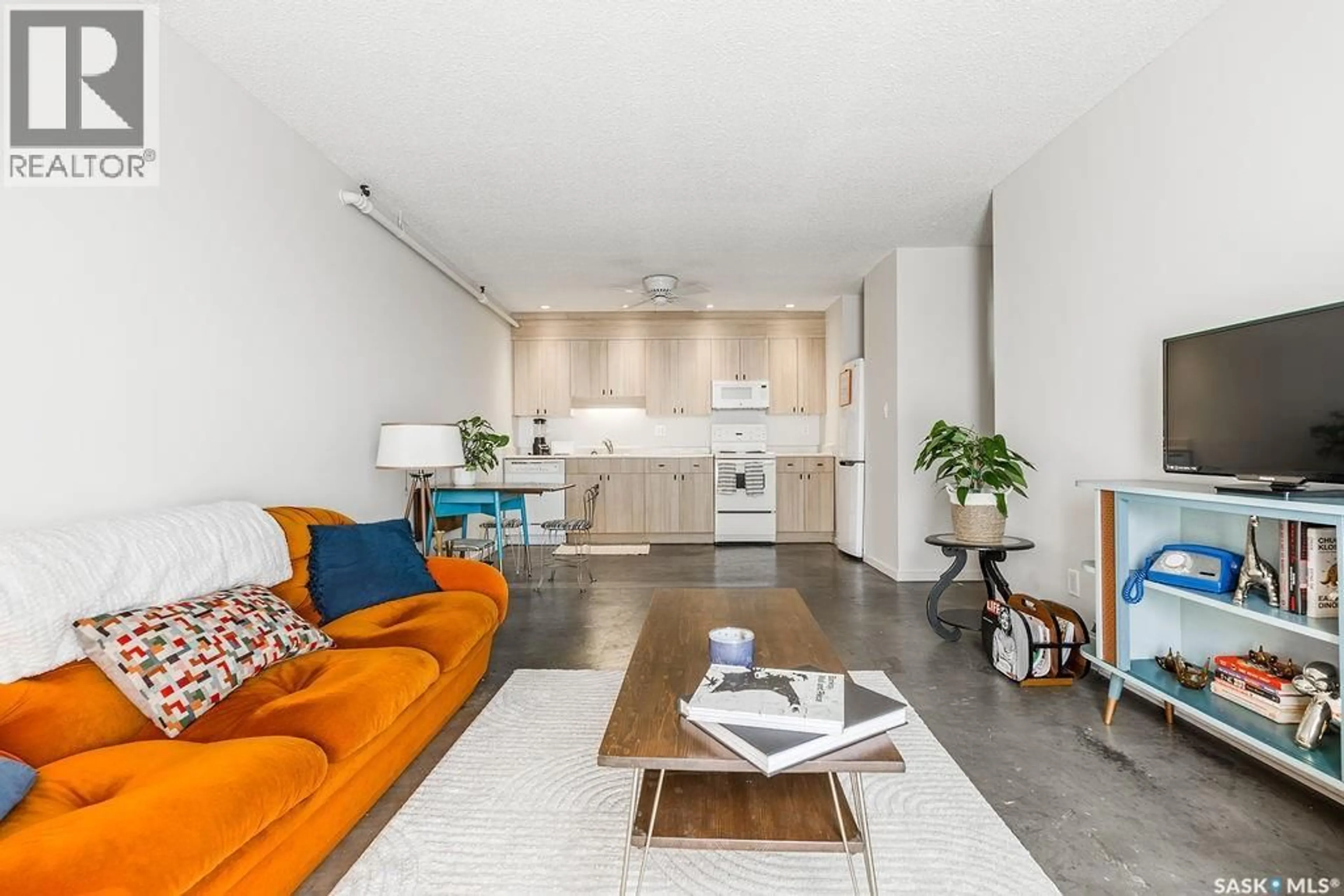 Living room with furniture, cement floor for 26 111 ST LAWRENCE CRESCENT, Saskatoon Saskatchewan S7K1G7