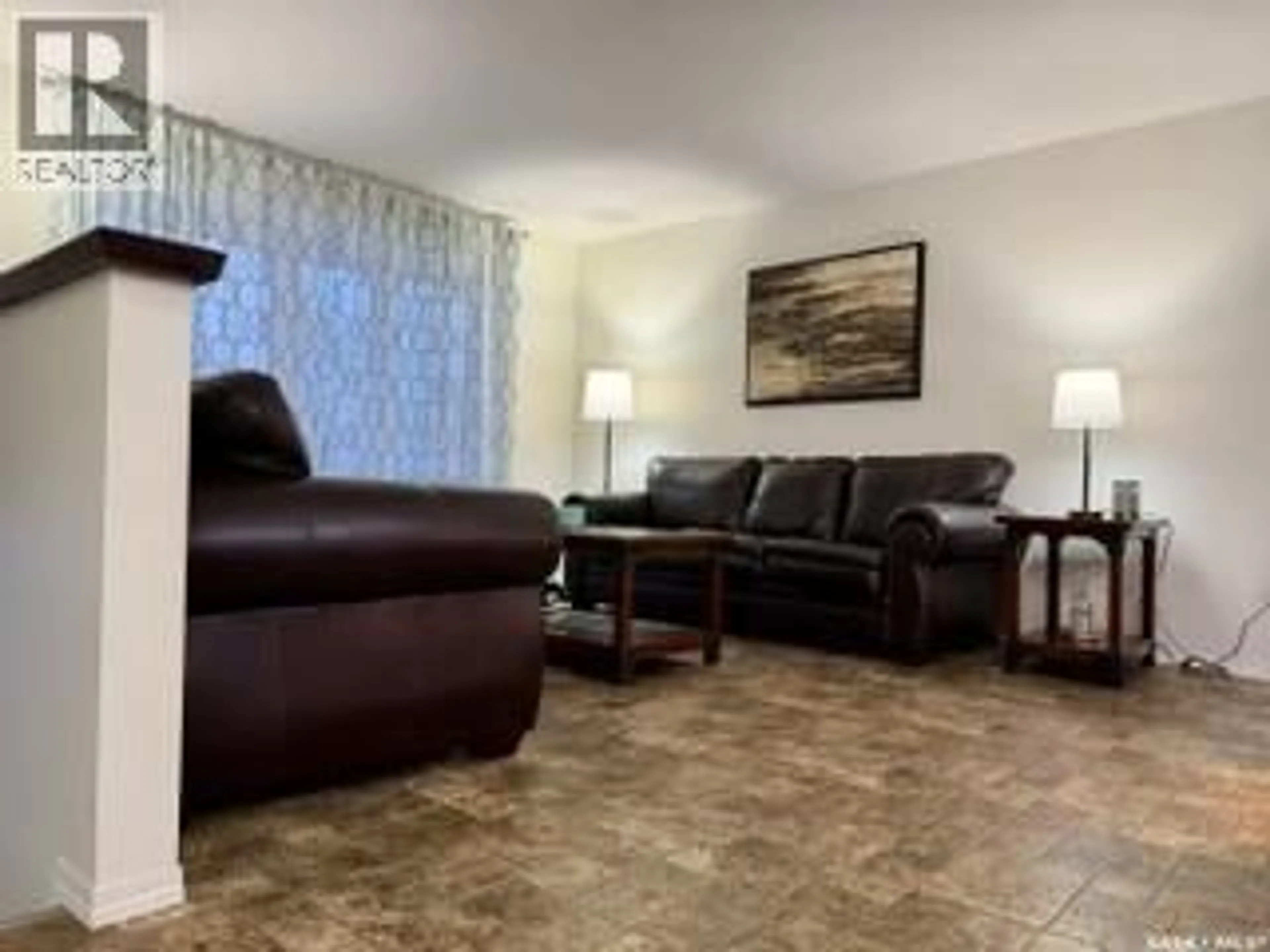 Living room with furniture, unknown for 405 3RD AVENUE, Biggar Saskatchewan S0K0M0