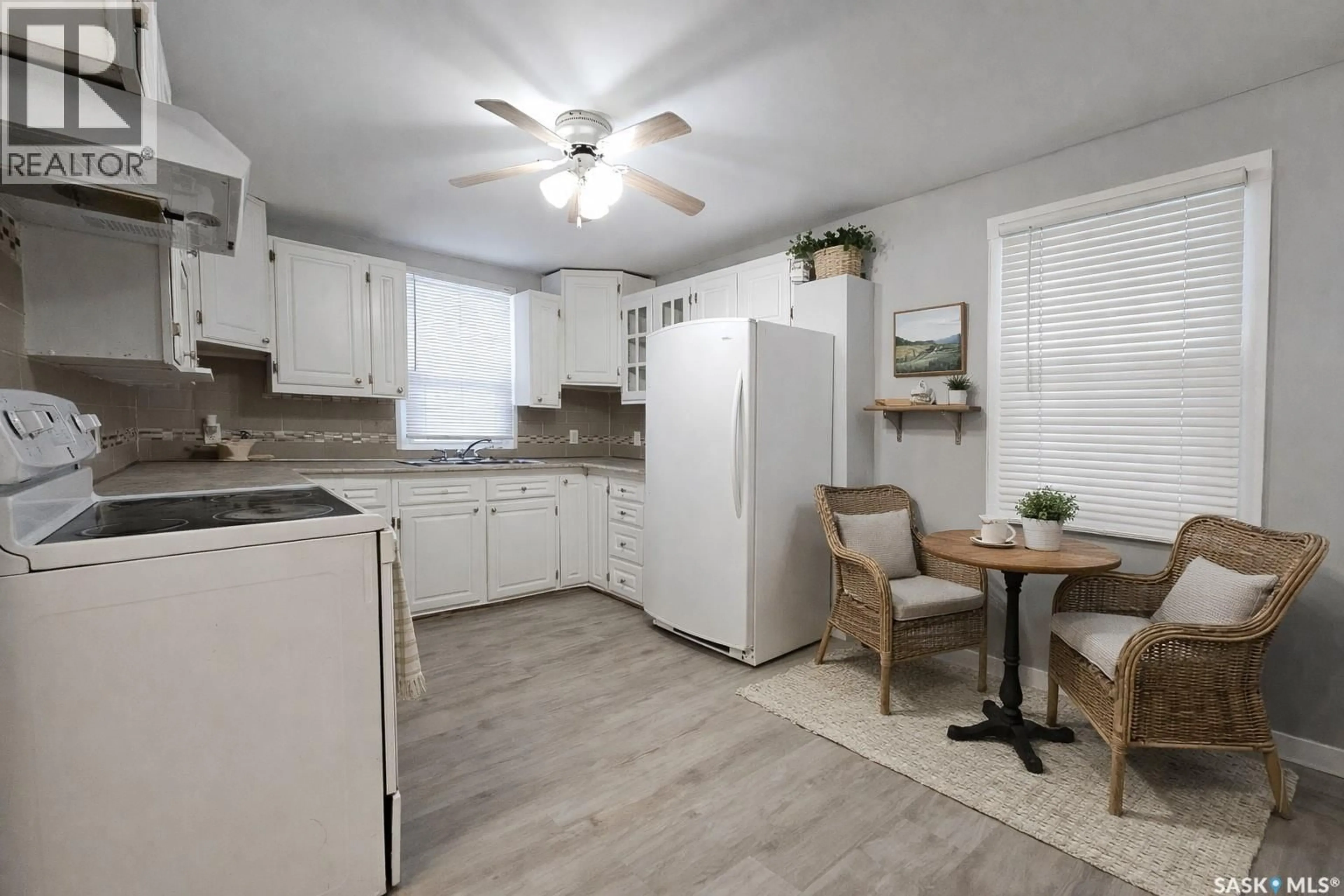 Open concept kitchen, unknown for 1672 103RD STREET, North Battleford Saskatchewan S9A1L7