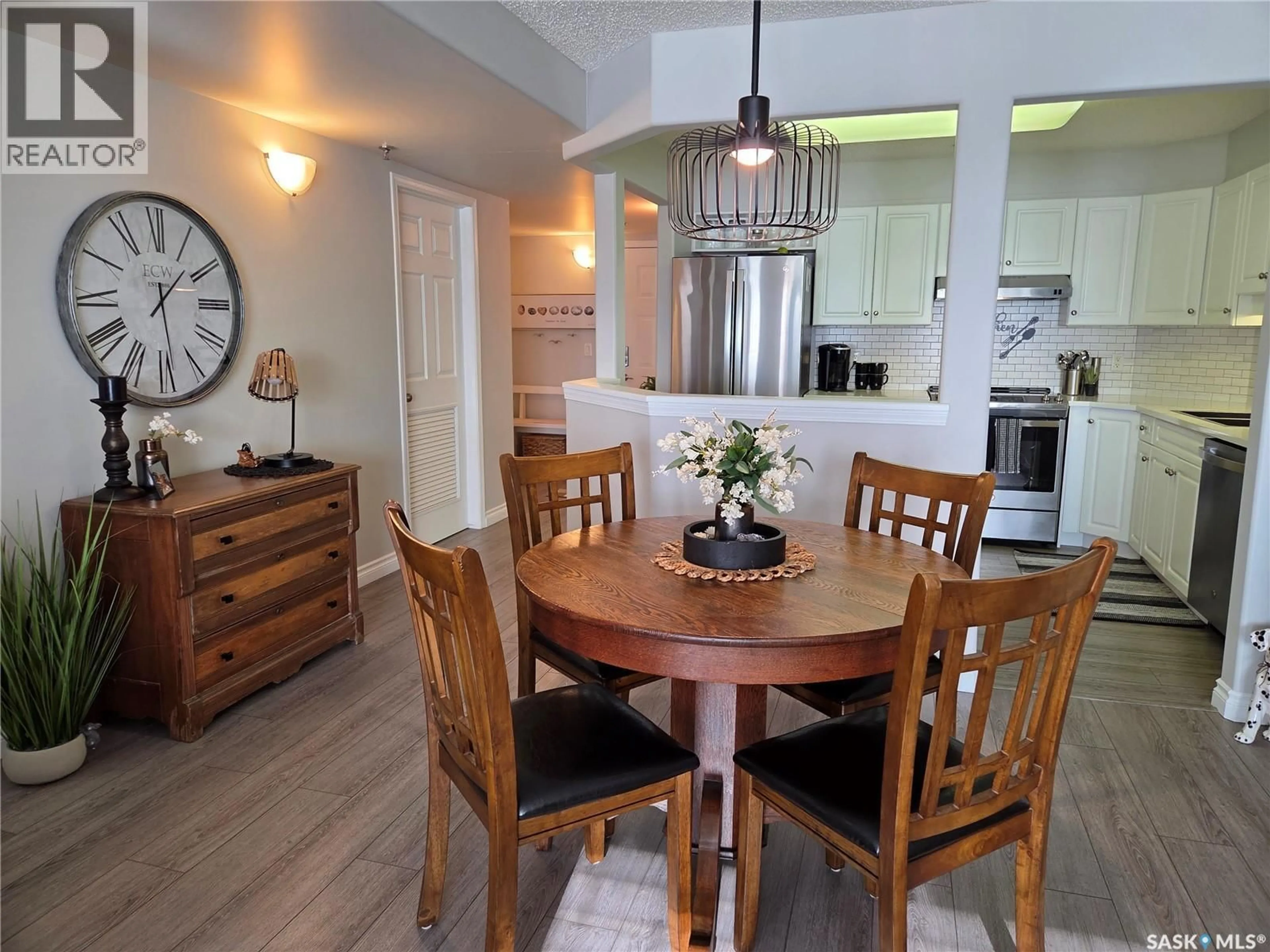 Open concept kitchen, wood/laminate floor for 202 729 101ST AVENUE, Tisdale Saskatchewan S0E1T0