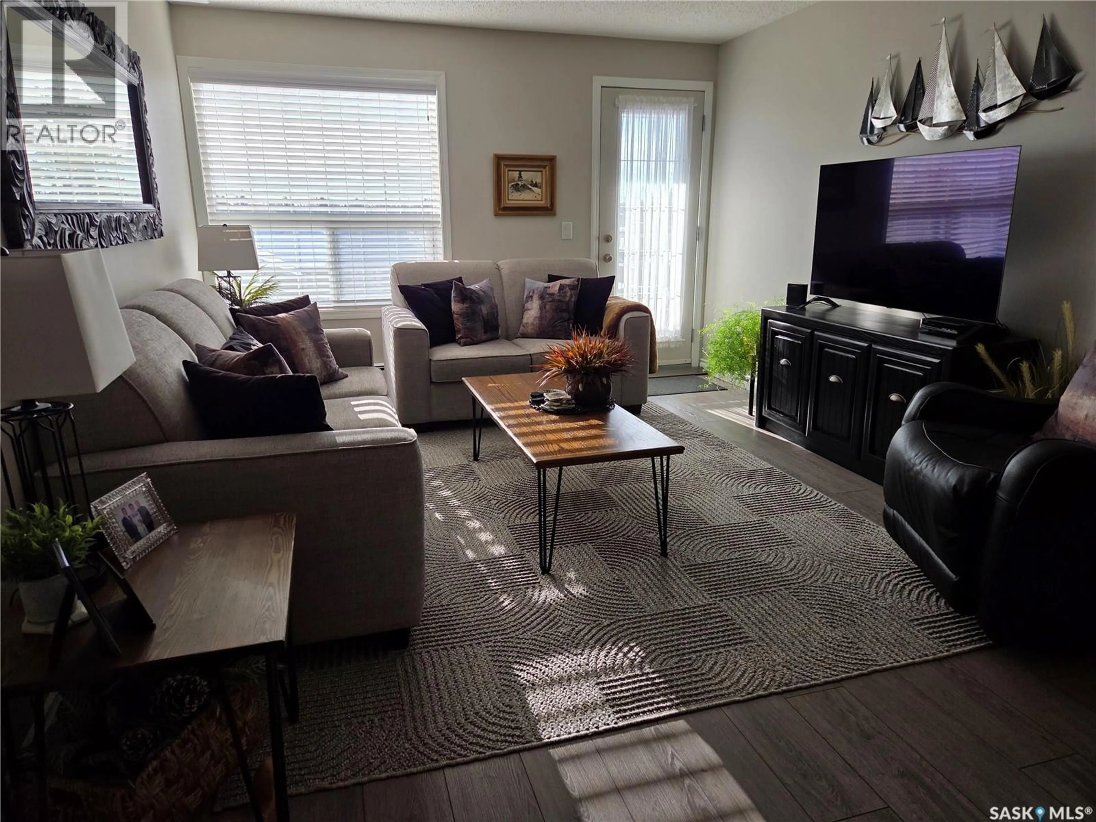 Living room with furniture, unknown for 202 729 101ST AVENUE, Tisdale Saskatchewan S0E1T0