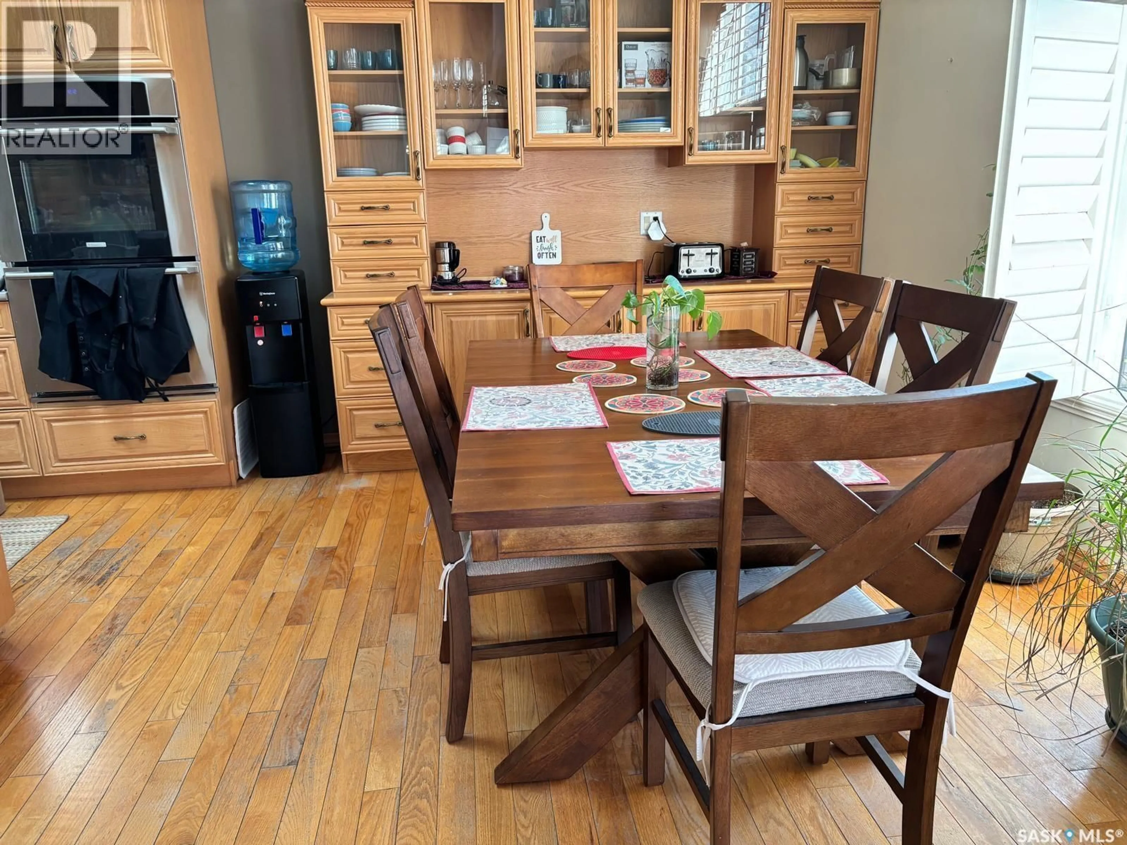 Dining room, wood/laminate floor for 833 PETERS AVENUE, Oxbow Saskatchewan S0C2B0