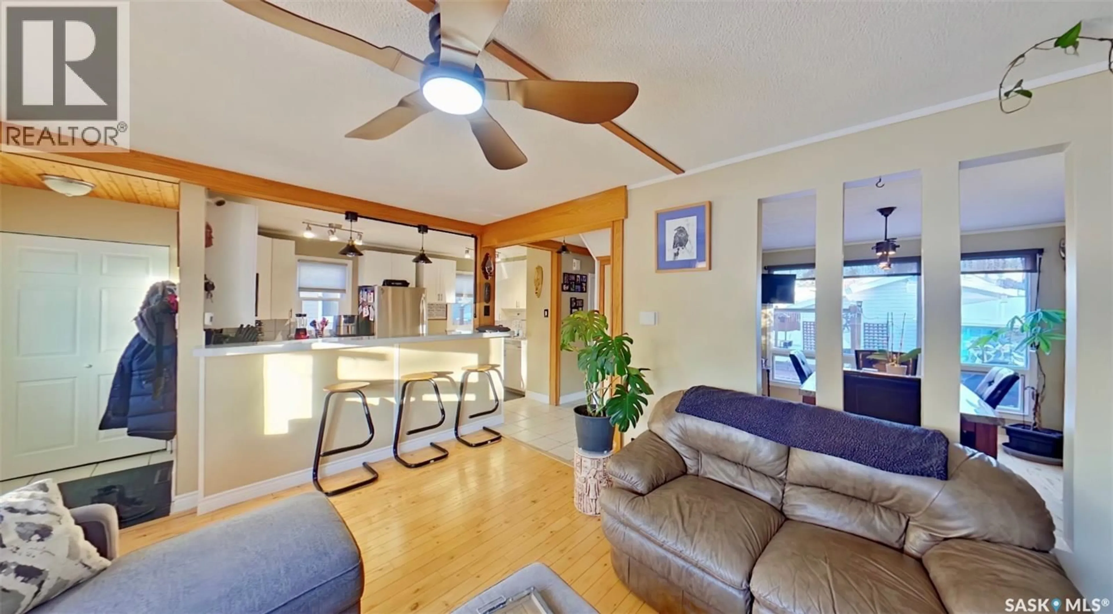 Open concept kitchen, wood/laminate floor for 45 INGERSOLL CRESCENT, Regina Saskatchewan S4T5Z2