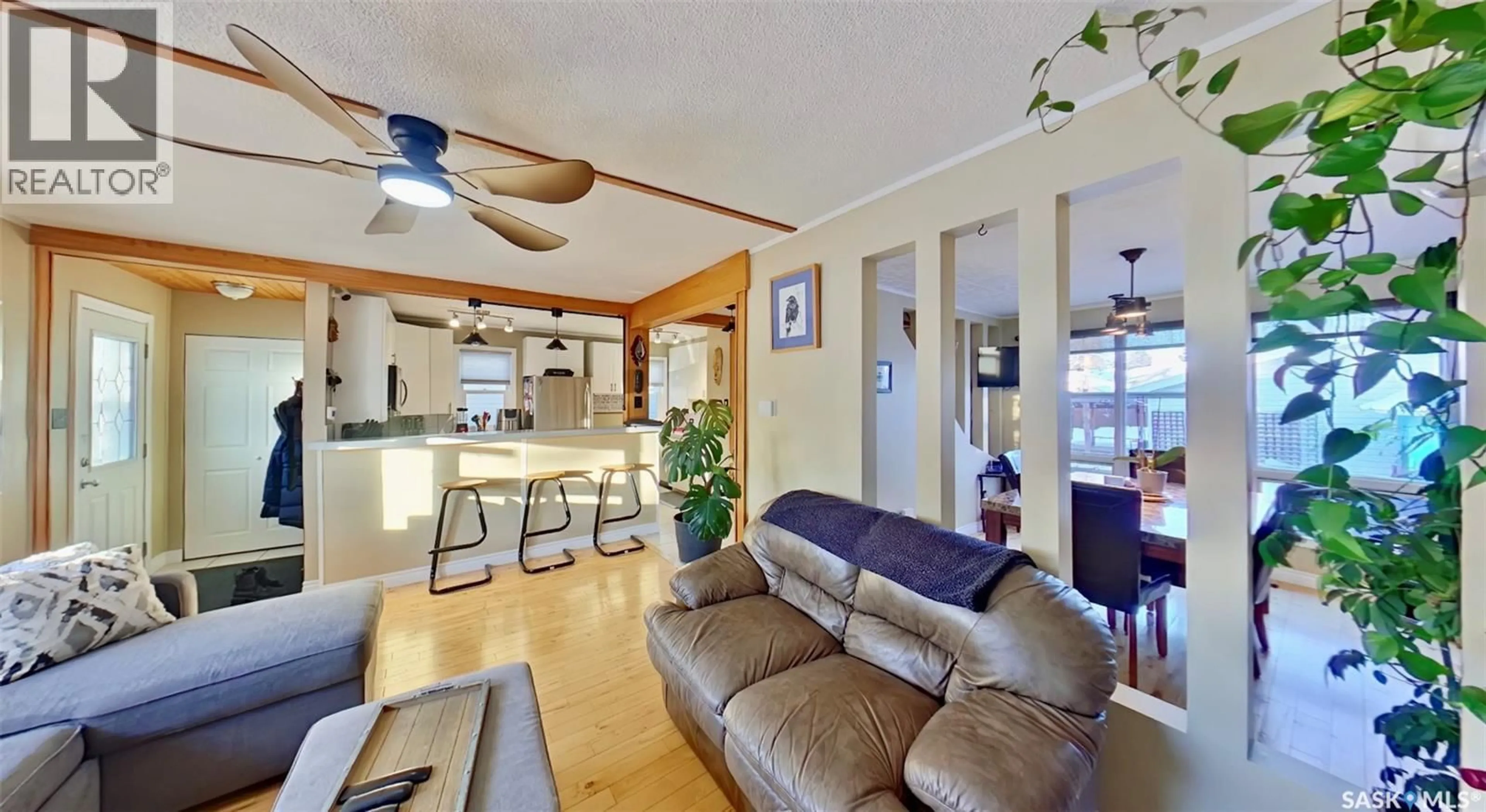 Open concept kitchen, wood/laminate floor for 45 INGERSOLL CRESCENT, Regina Saskatchewan S4T5Z2