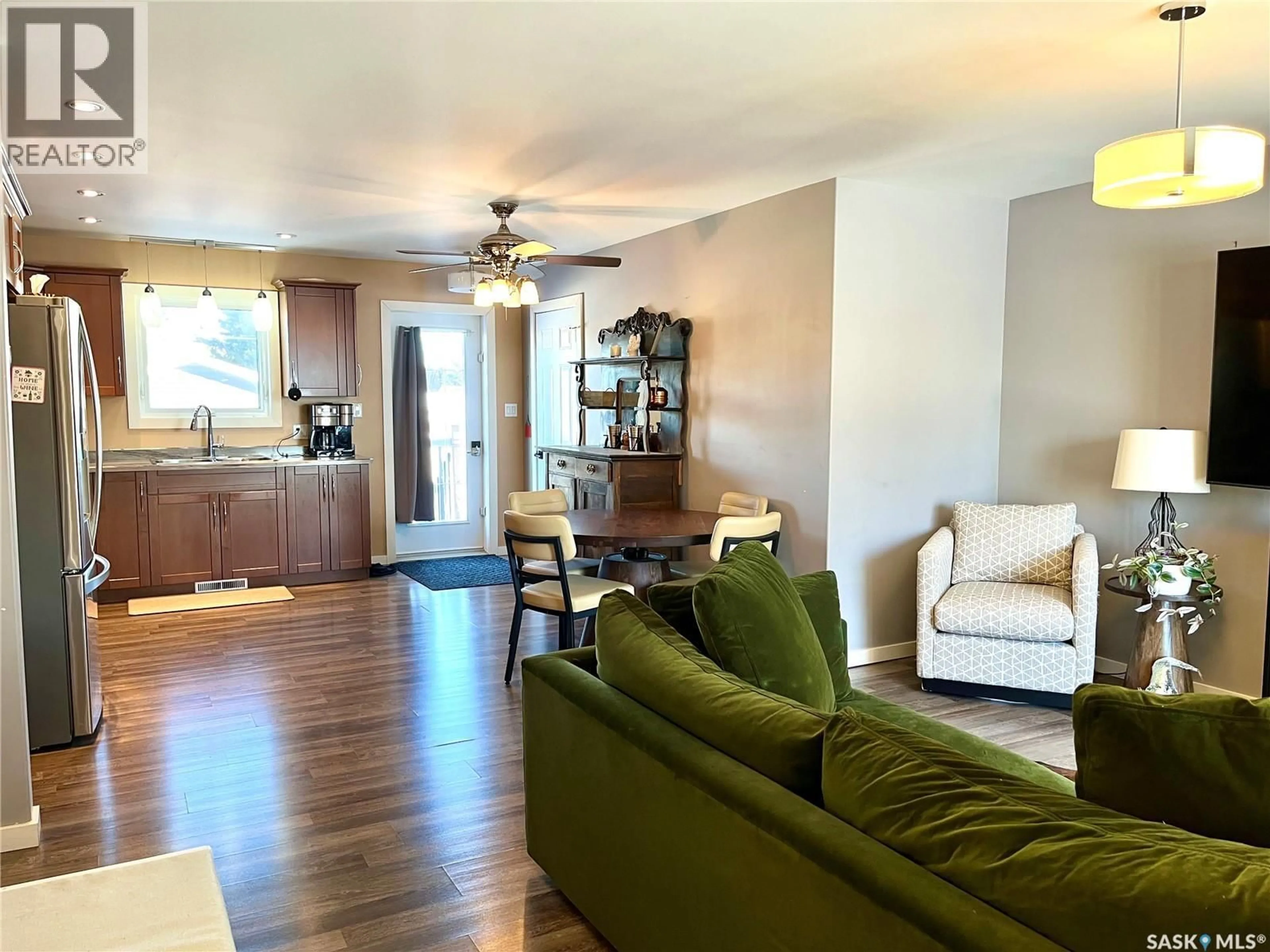 Living room with furniture, wood/laminate floor for 674 4TH AVENUE, Melville Saskatchewan S0A2P1