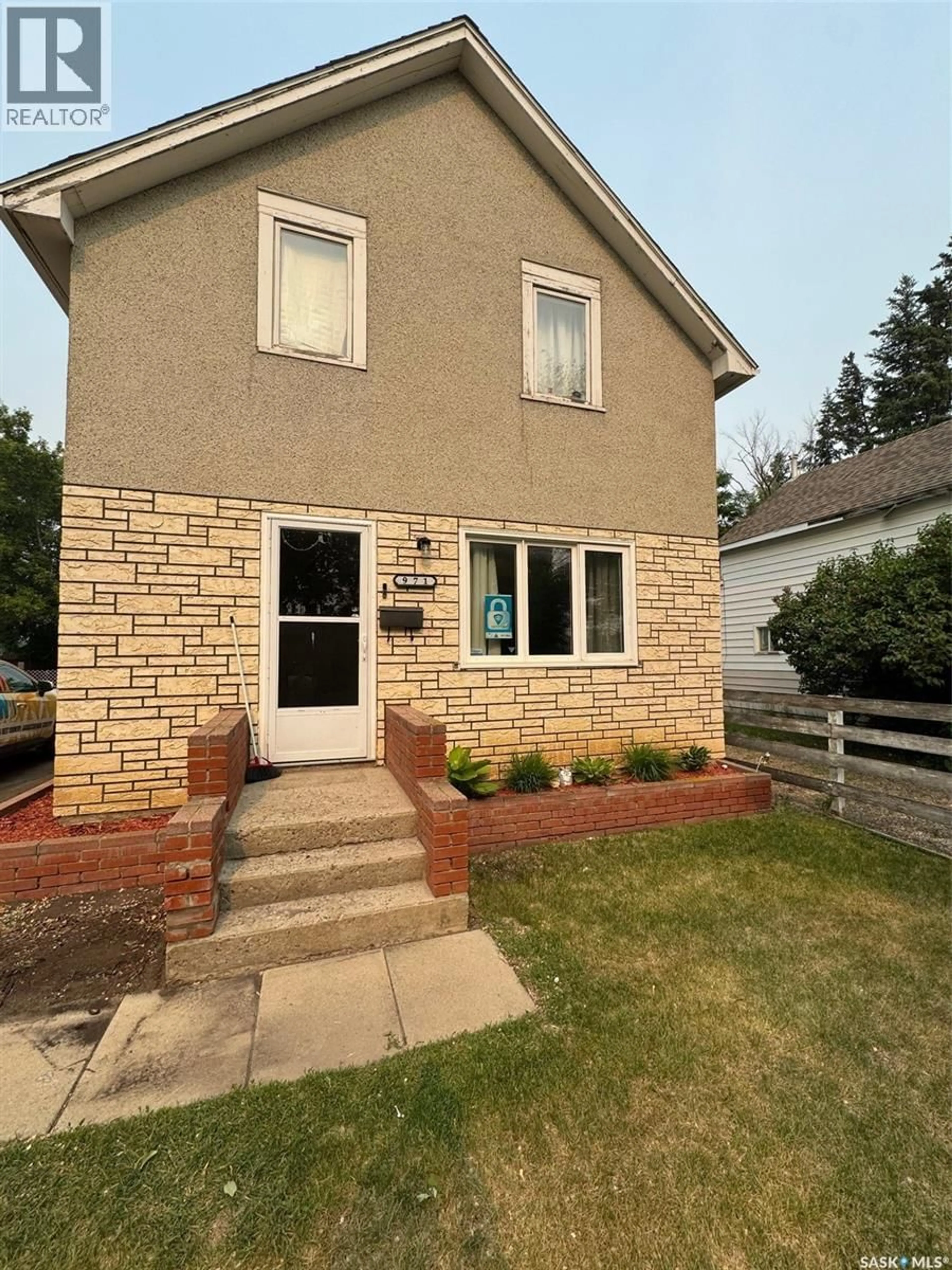 Home with brick exterior material, street for 971 108TH STREET, North Battleford Saskatchewan S9A2A7