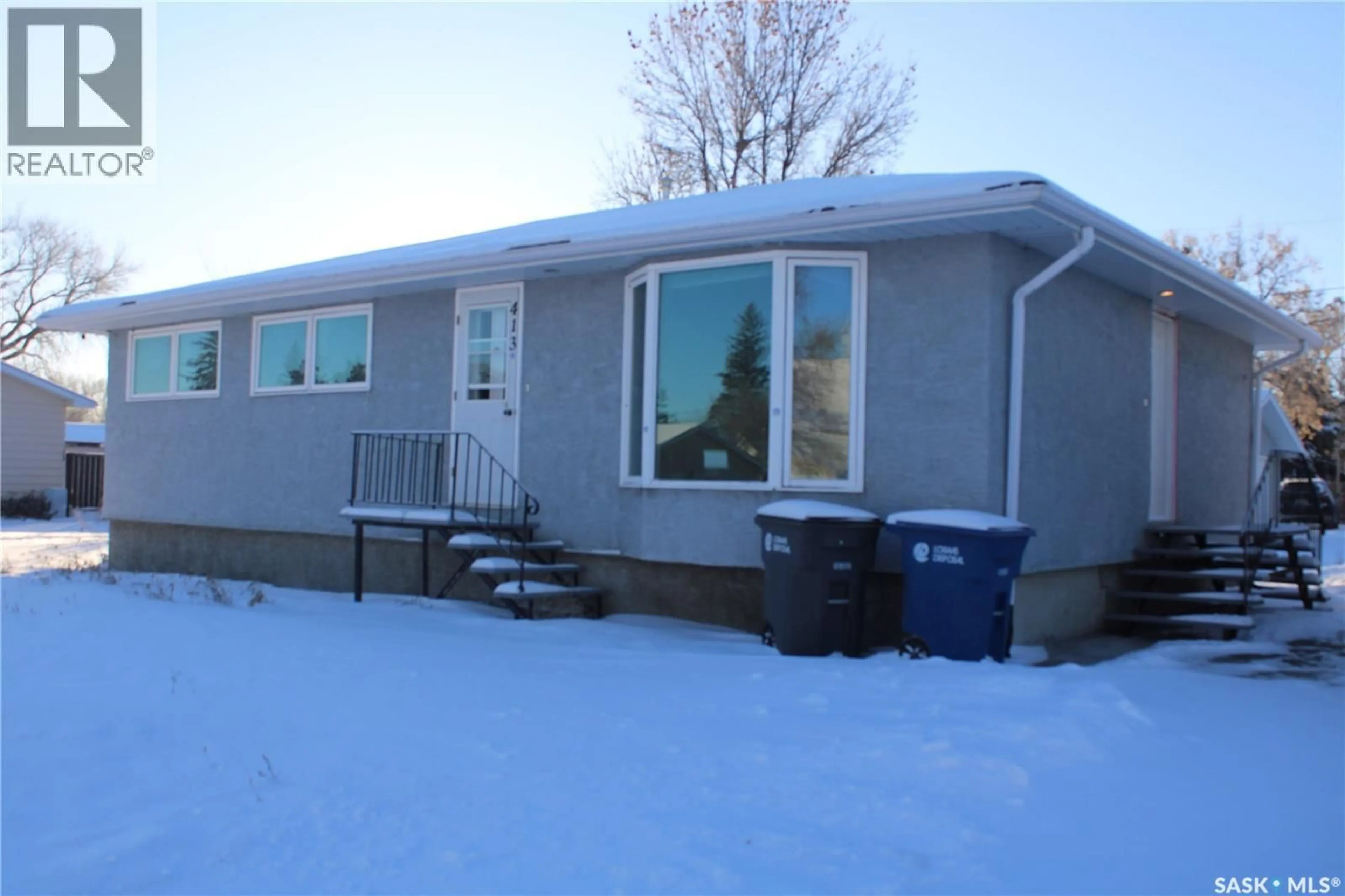 Home with vinyl exterior material, street for 413 1ST STREET, Kipling Saskatchewan S0G2S0