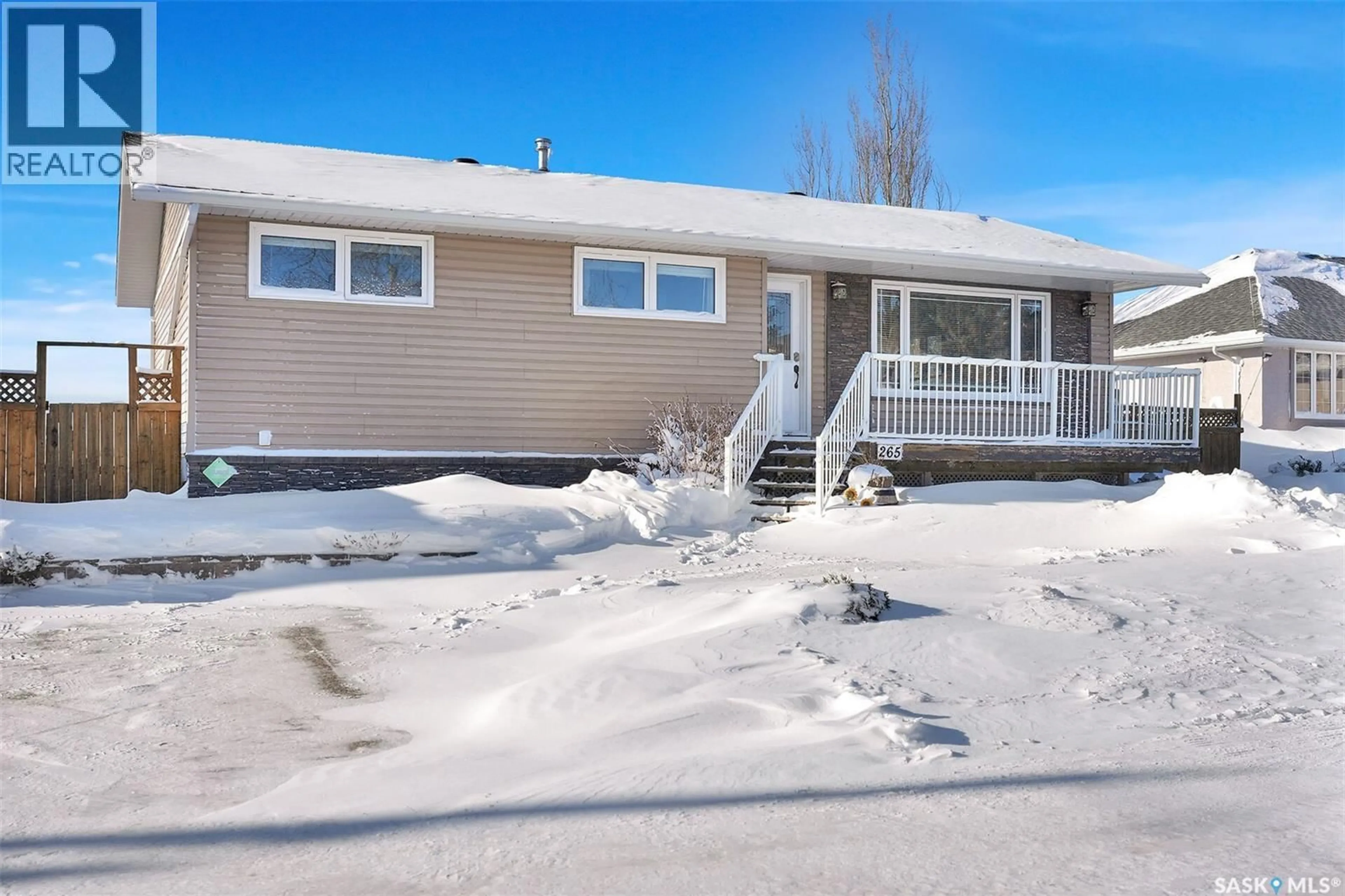Home with vinyl exterior material, street for 265 MILTON STREET, Southey Saskatchewan S0G4P0