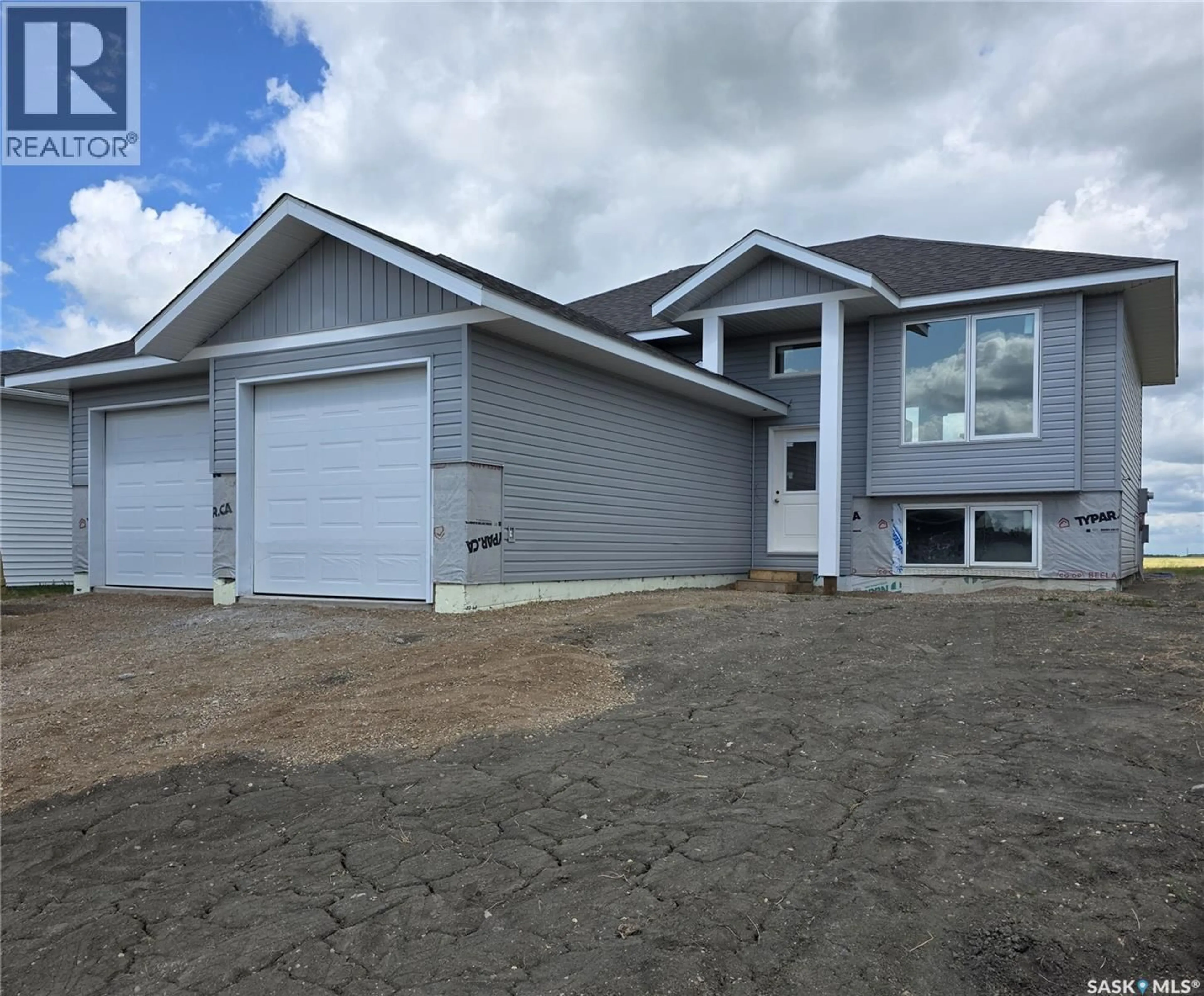 Home with vinyl exterior material, unknown for 713 DOGHIDE DRIVE, Tisdale Saskatchewan S0E1T0