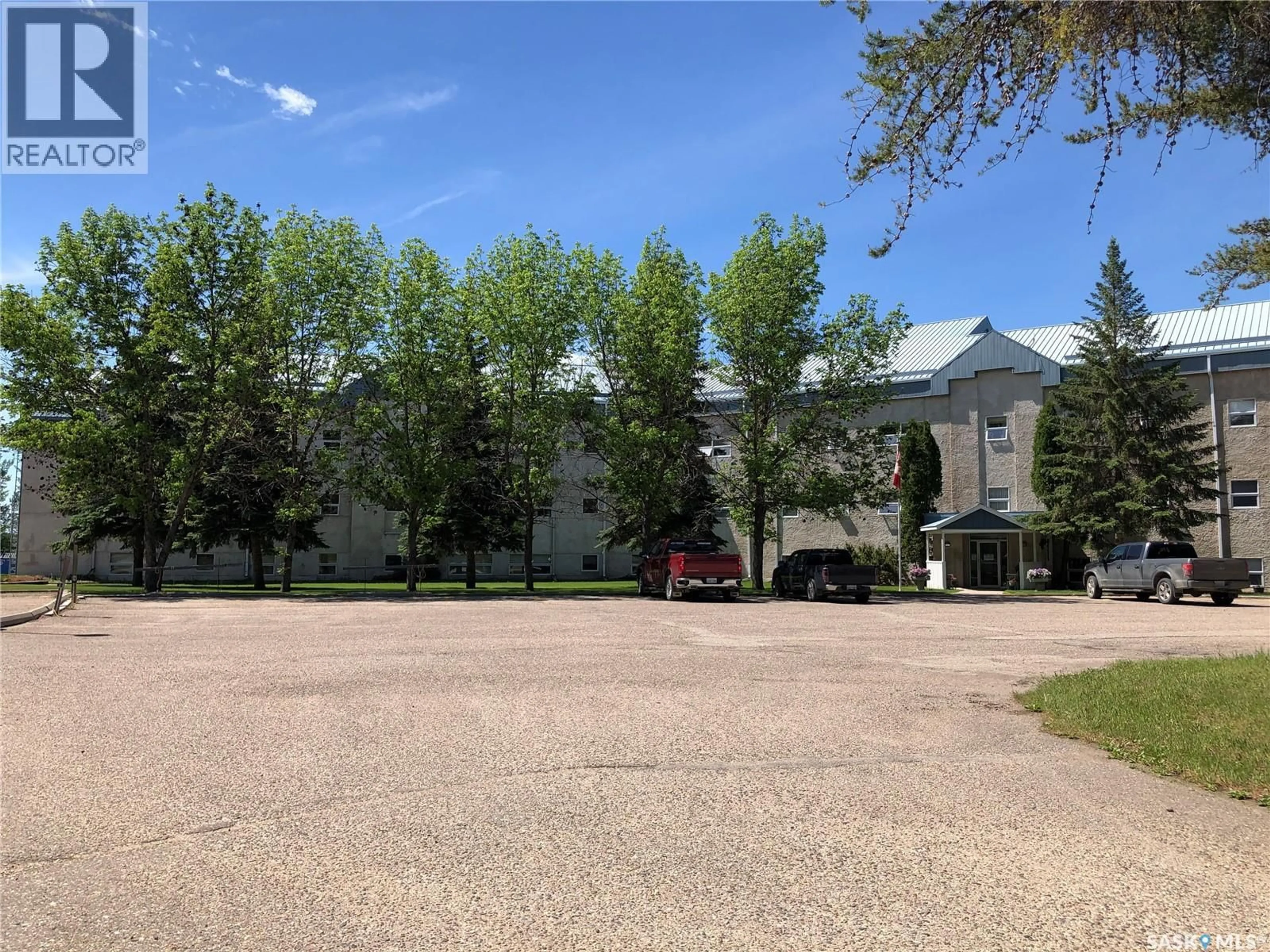 A pic from outside/outdoor area/front of a property/back of a property/a pic from drone, street for 308 102 MANOR DRIVE, Nipawin Saskatchewan S0E1E0