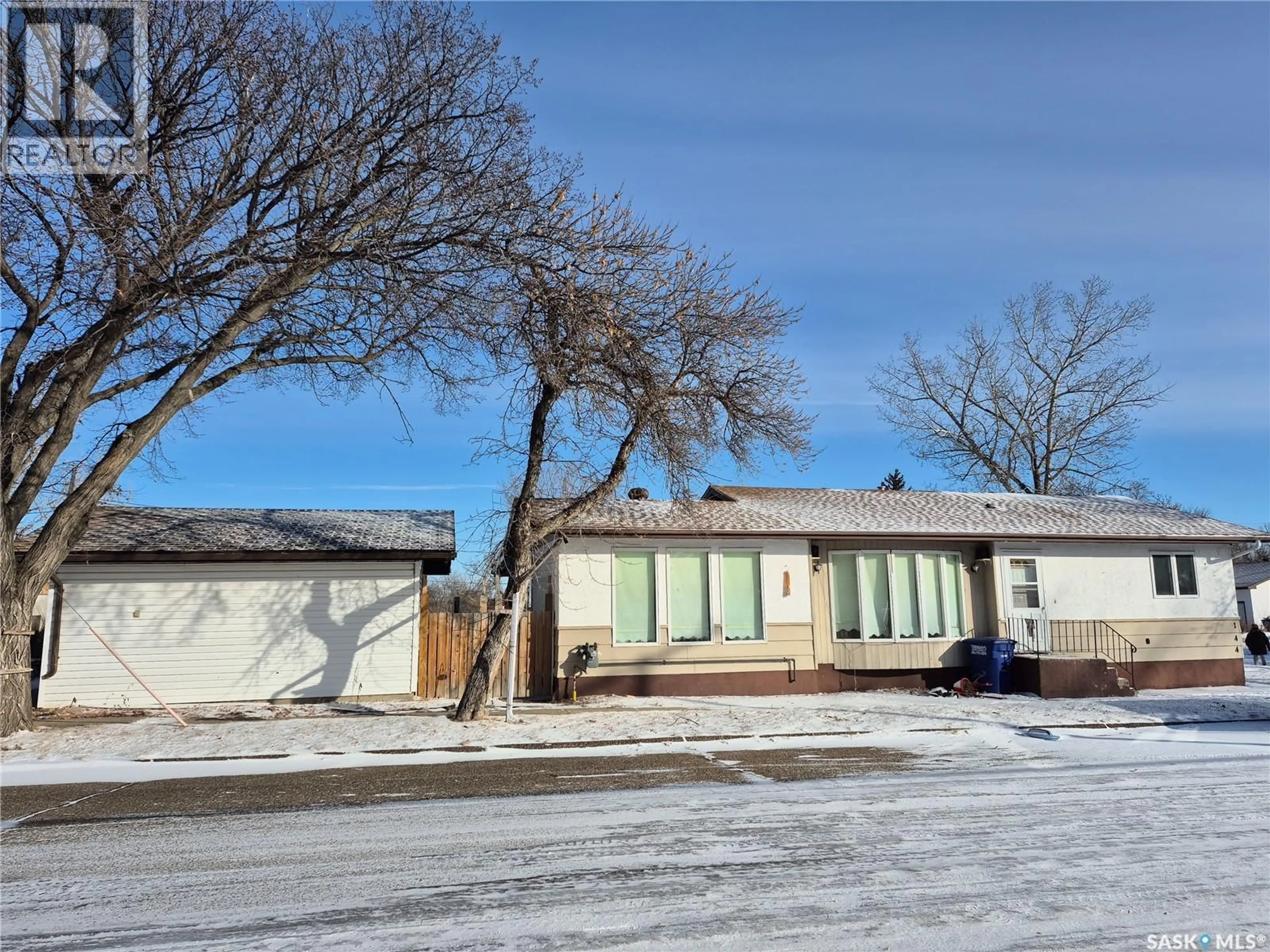 A pic from outside/outdoor area/front of a property/back of a property/a pic from drone, street for 144 2ND STREET, Ponteix Saskatchewan S0N1Z0