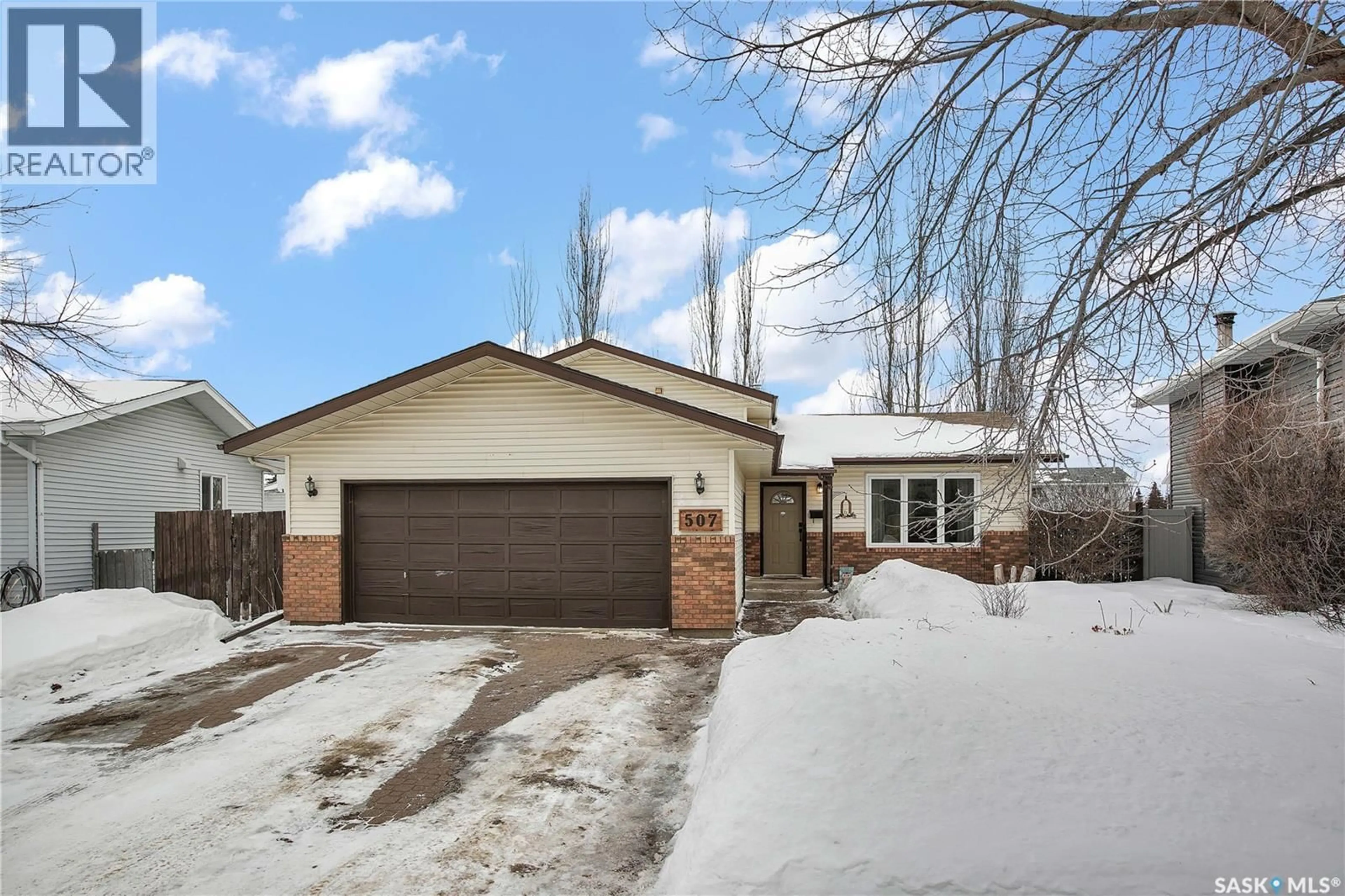 Home with brick exterior material, street for 507 WILKINSON CRESCENT, Saskatoon Saskatchewan S7N3L7